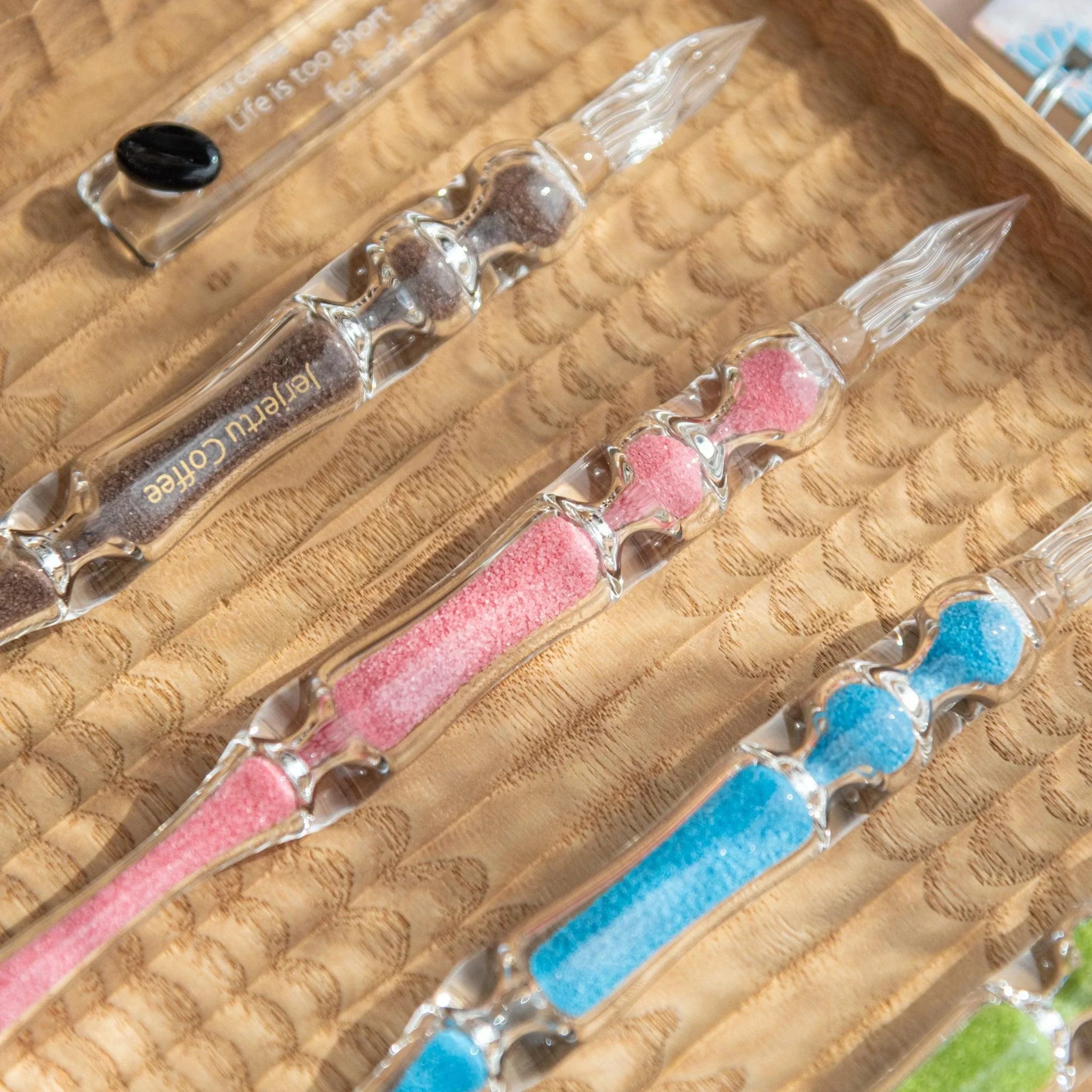 Sakura Hourglass Glass Dip Pen front view showing glass nib and hourglass barrel with pink sakura Japanese design