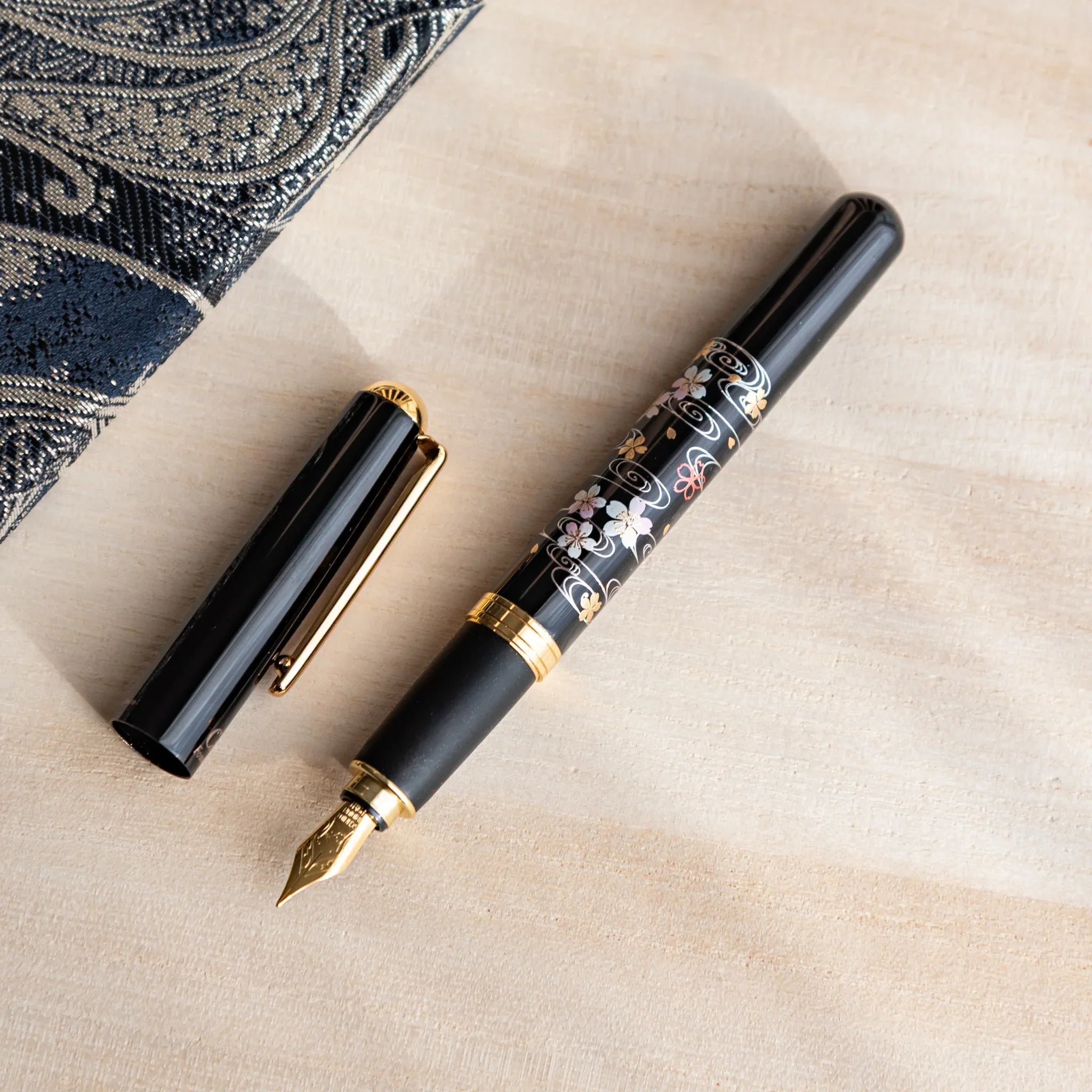 Sakura over the River Yamanaka Fountain Pen, top-down perspective with detail providing full visual representation and produc