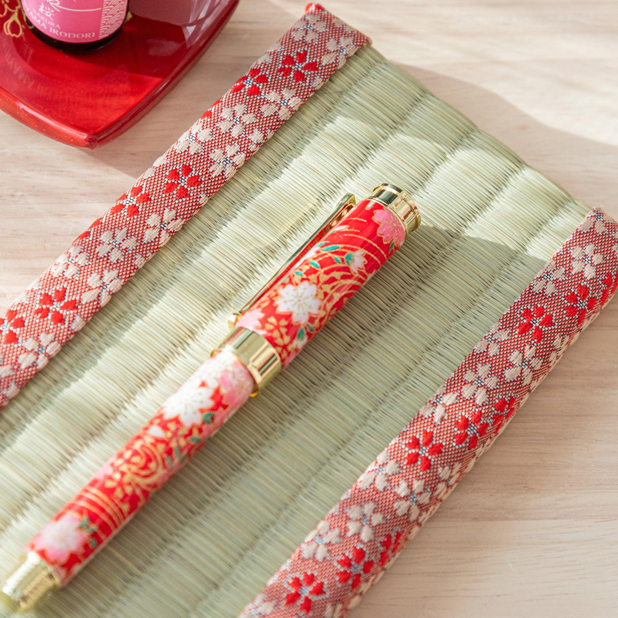 Sakura tatami pen tray flat view showing cherry blossom motif on authentic tatami mat surface, Japanese construction