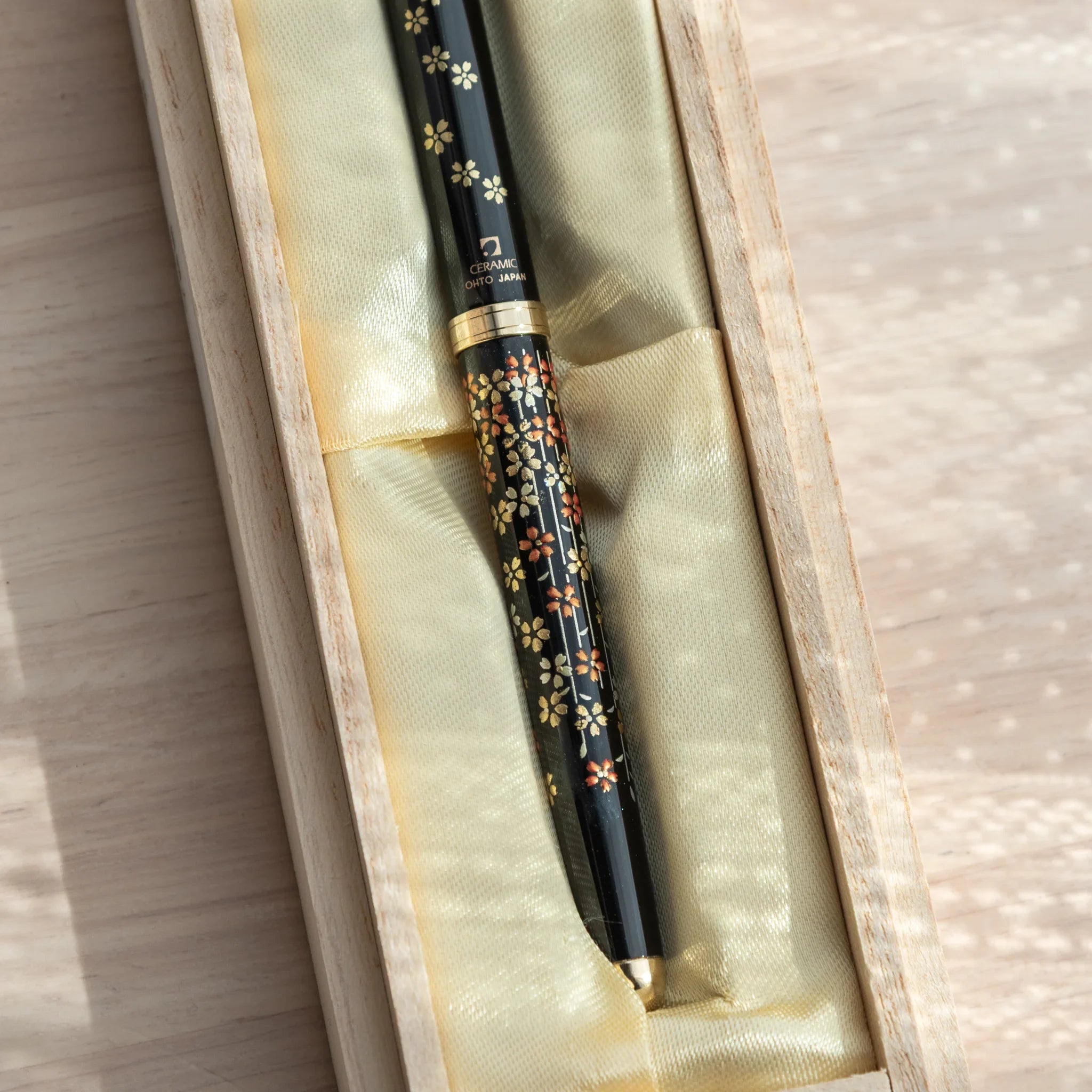 hand-made Yamanaka ballpoint pen features sakura cherry blossom design in traditional lacquer made