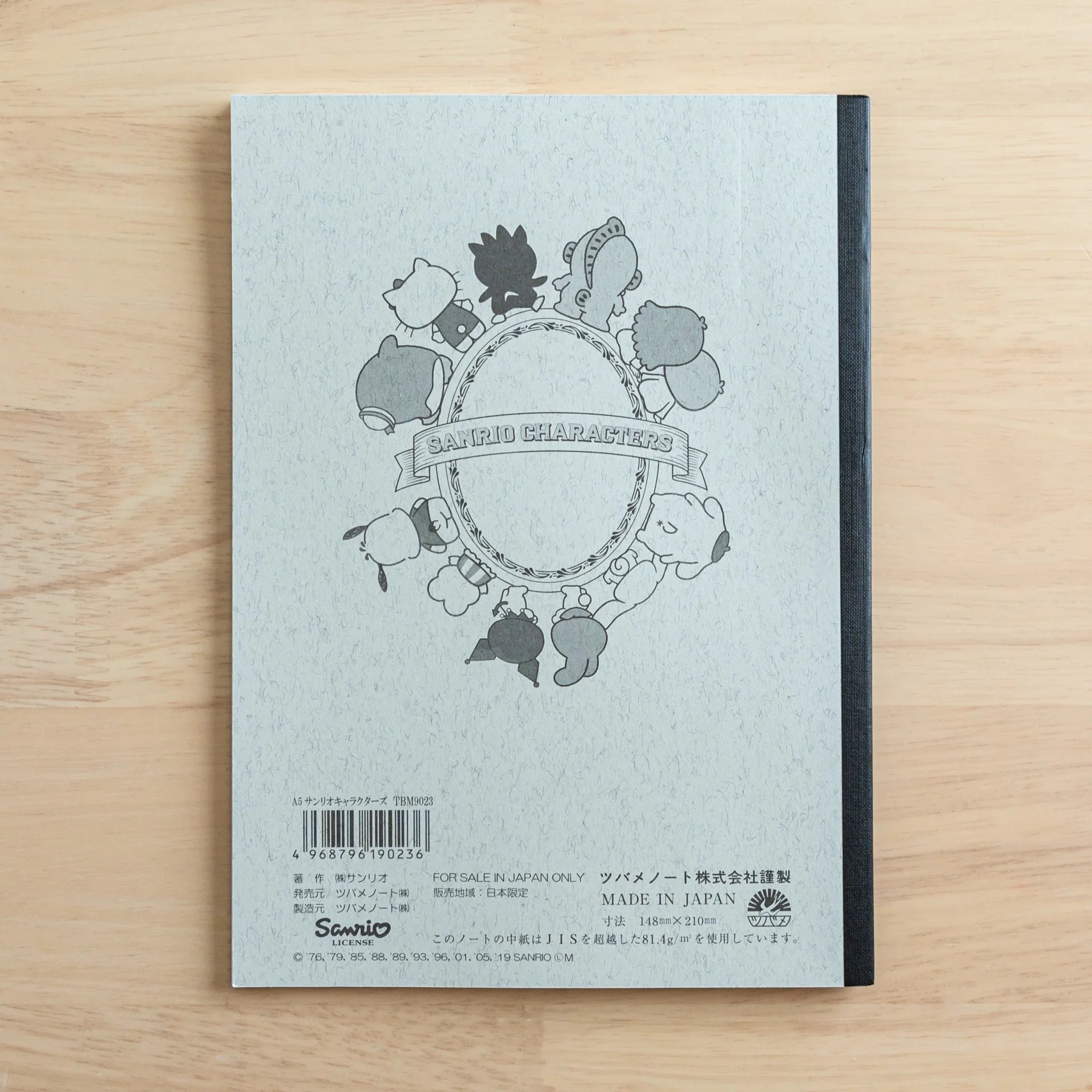 Tsubame notebook back cover with Sanrio characters in circular arrangement and barcode displayed on white background