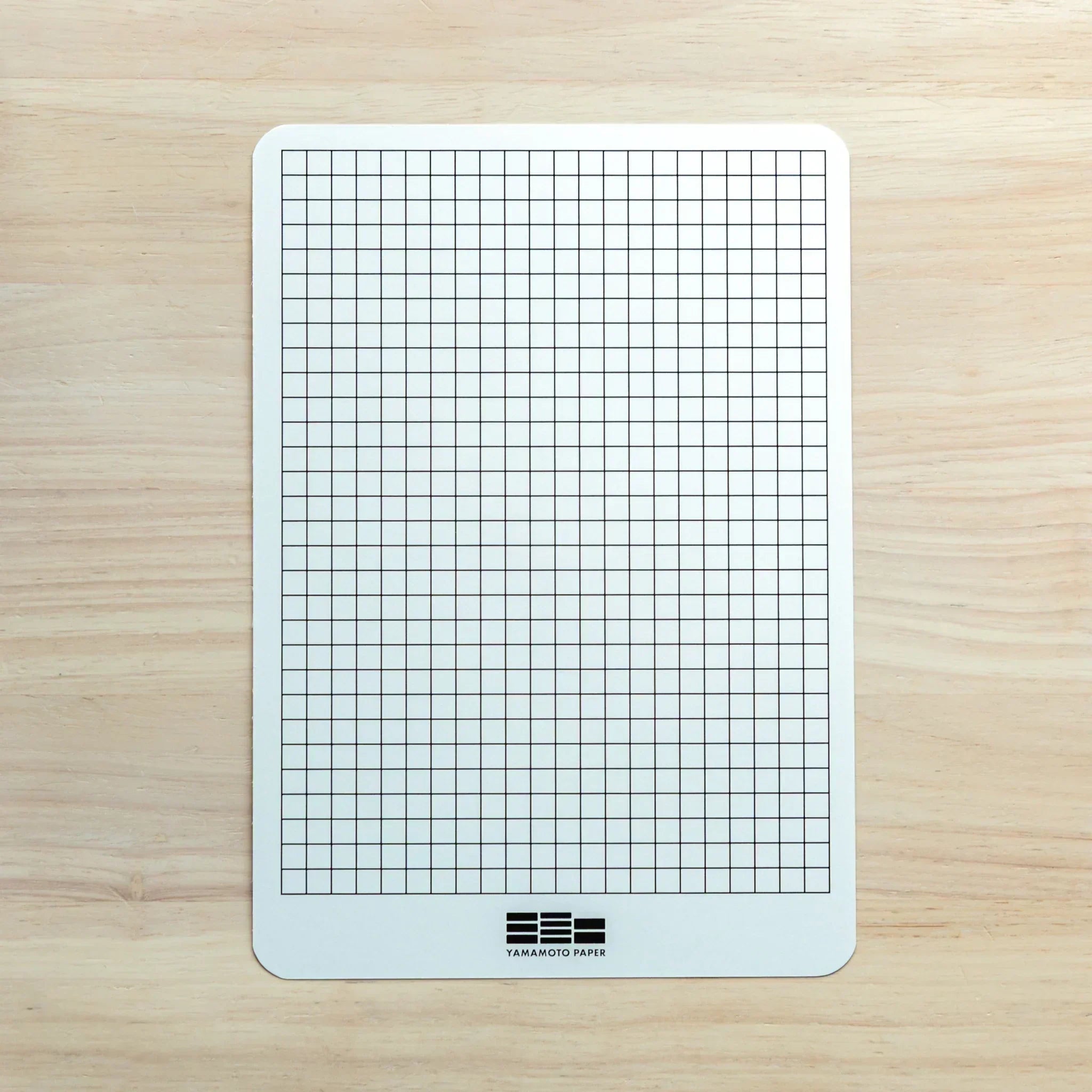 Grid accessory sheet for Sanzen Tomoe River A5 Japanese Writing Pad, ideal for alignment and note precision.