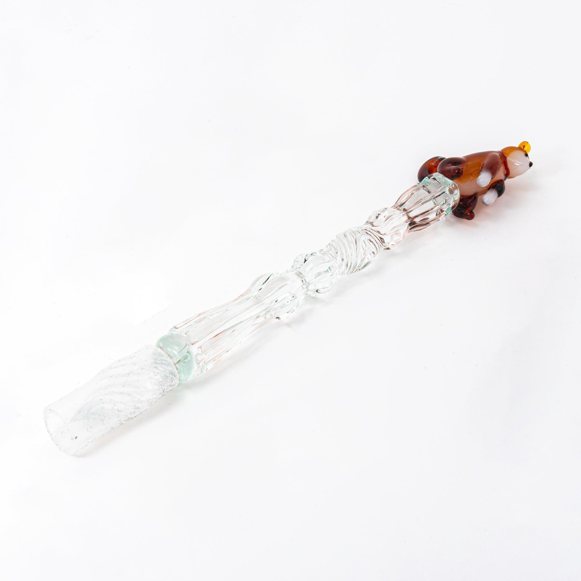 Detailed glass pen with Shiba Inu topper and clear light green shaft, close-up of the nib. A must-have for collectors.