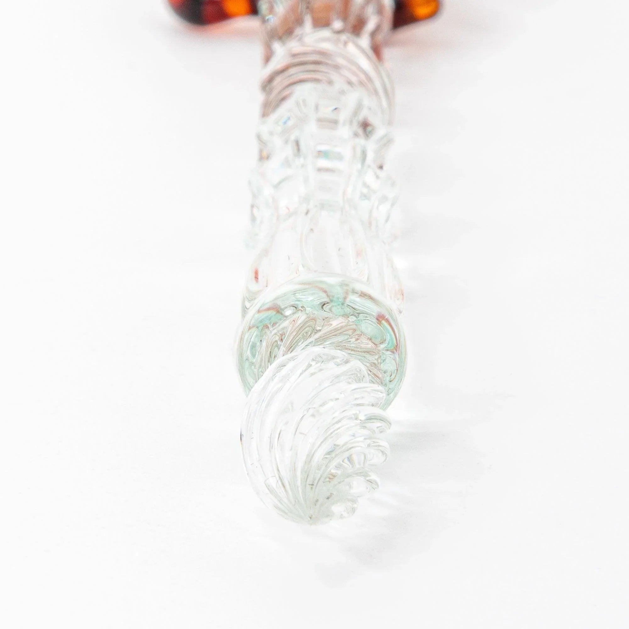 Japanese glass dip pen with warm amber-toned ribbed textured barrel and ceramic Shiba Inu dog figure topper