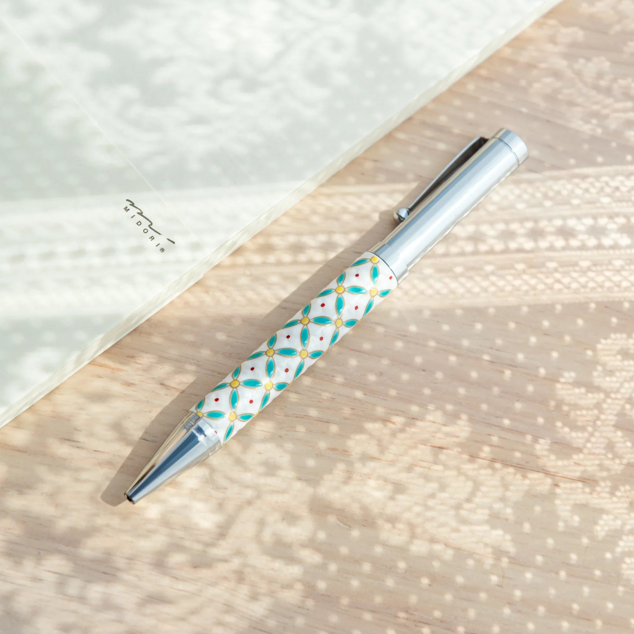 Kutani ceramic ballpoint pen featuring shippo floral diamond pattern in classic Japanese featuring traditional porcelain
