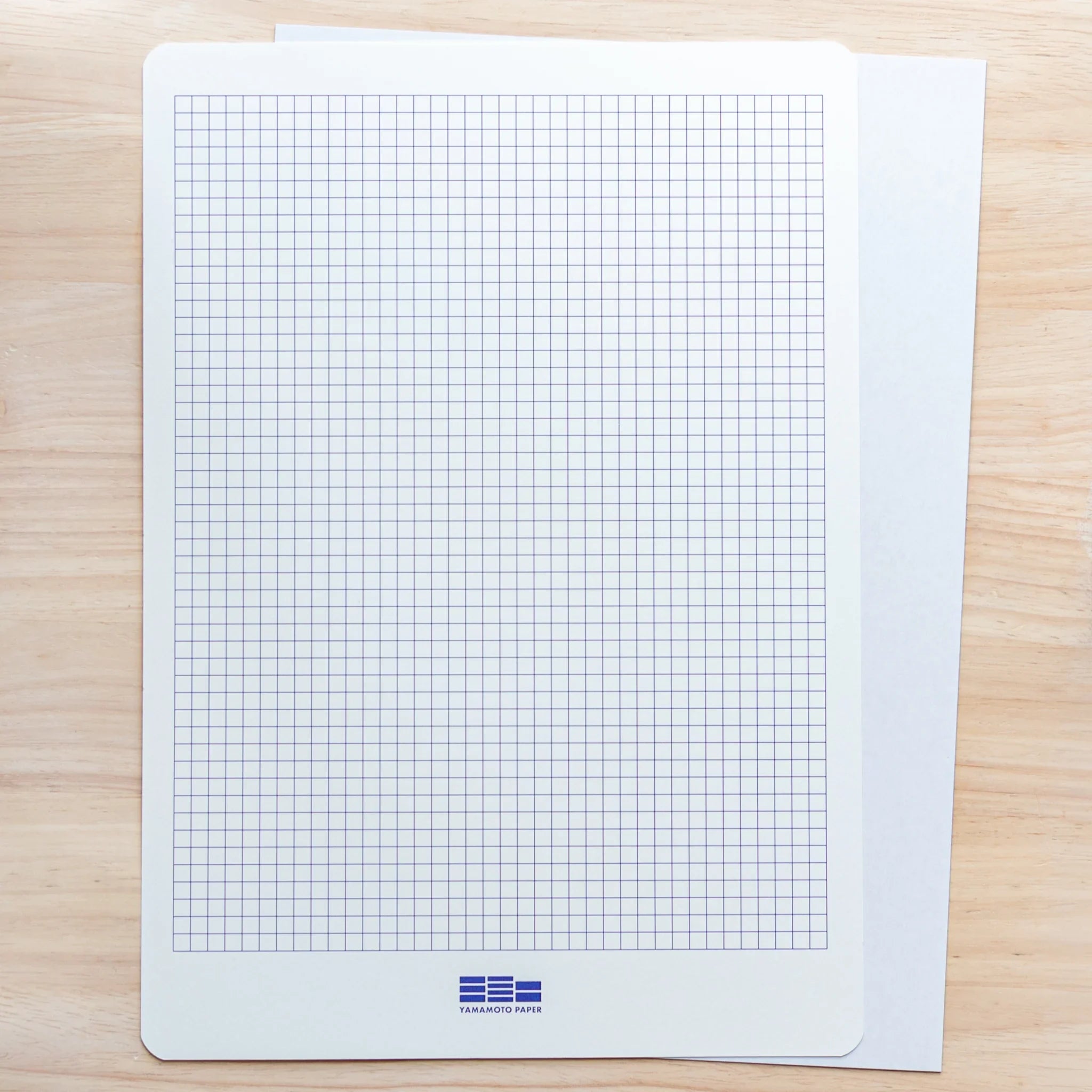 Slight White A4 Loose Leaf Paper shown displaying fine quality white paper surface, Japanese stationery