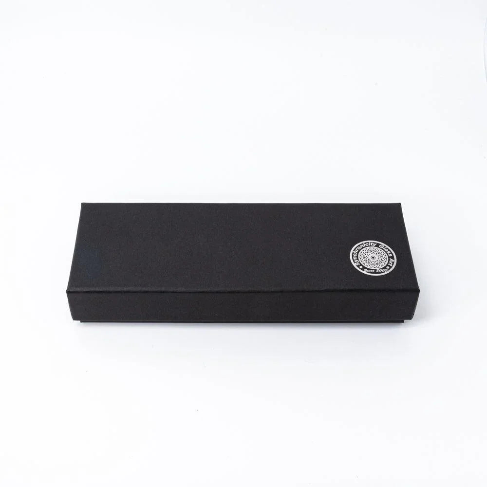 Black gift box for Smoke in Verdure glass dip pen angled on white background showing product packaging