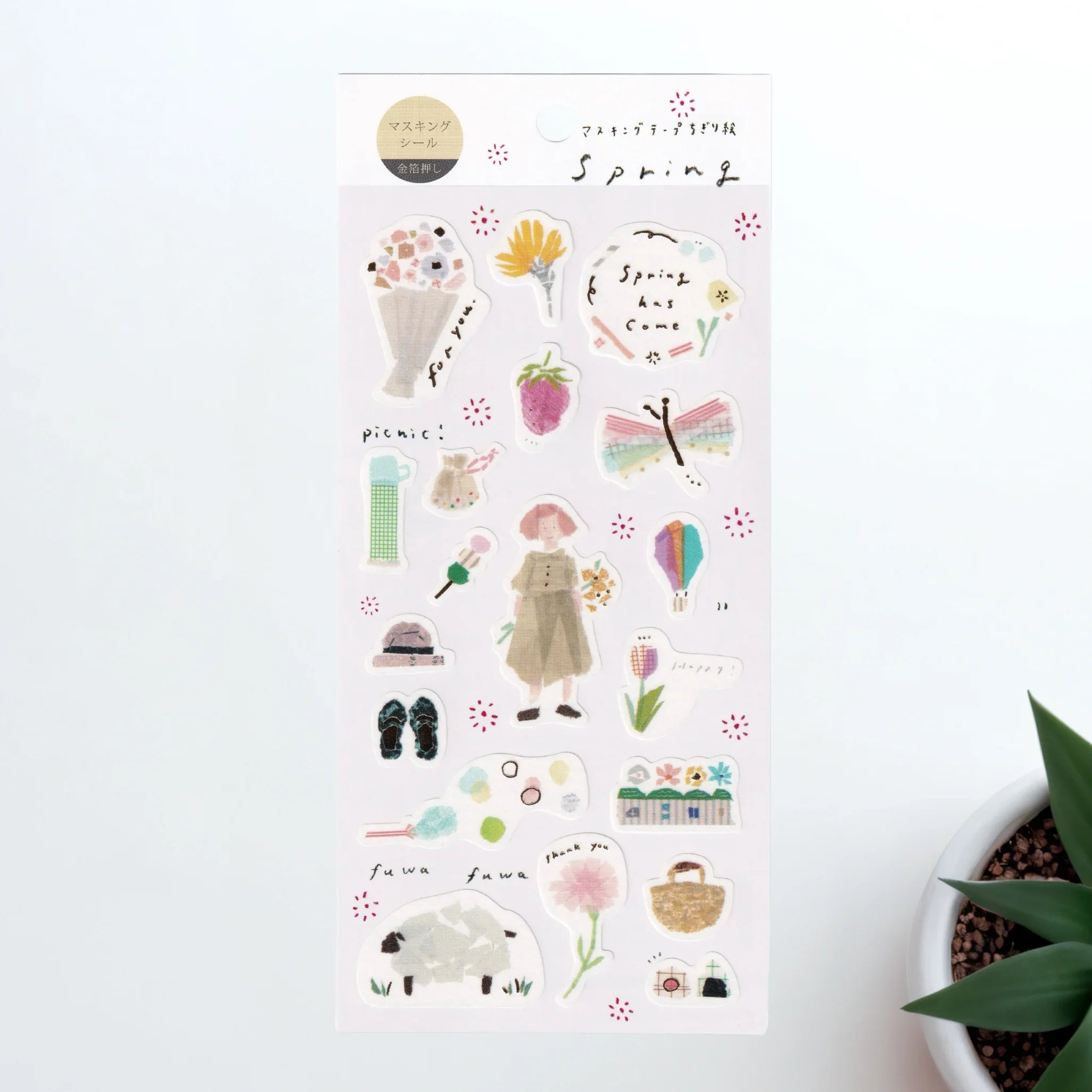Japanese sticker sheet with spring season flowers and botanical motifs in soft pastel colors on cream background