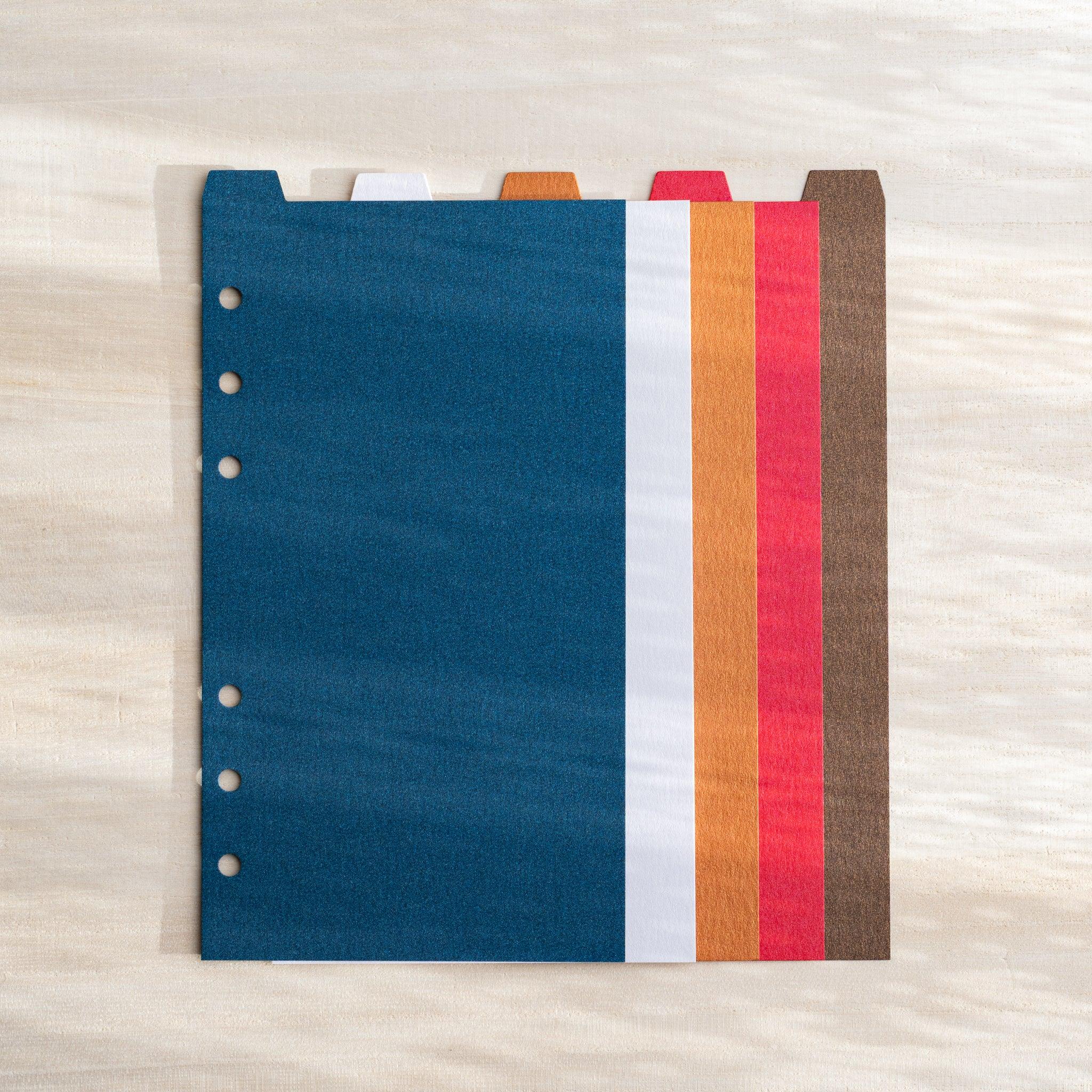 Japanese Stationery Stardream index divider for Bible size planners featuring blue, white, orange, red and brown stripes.