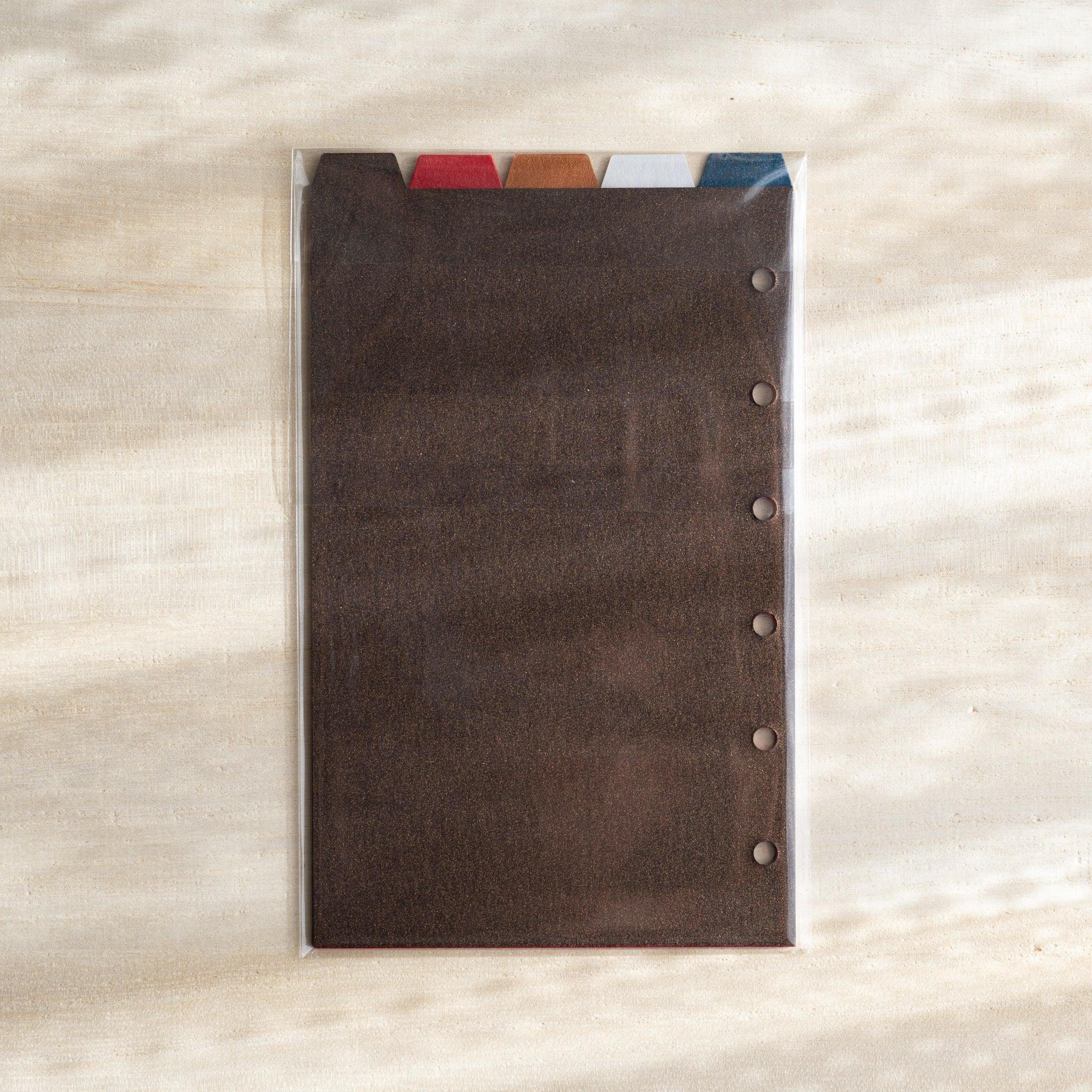 Japanese Stationery Stardream index dividers for Mini 6 planners packaged in clear plastic with brown cover and pastel tabs.