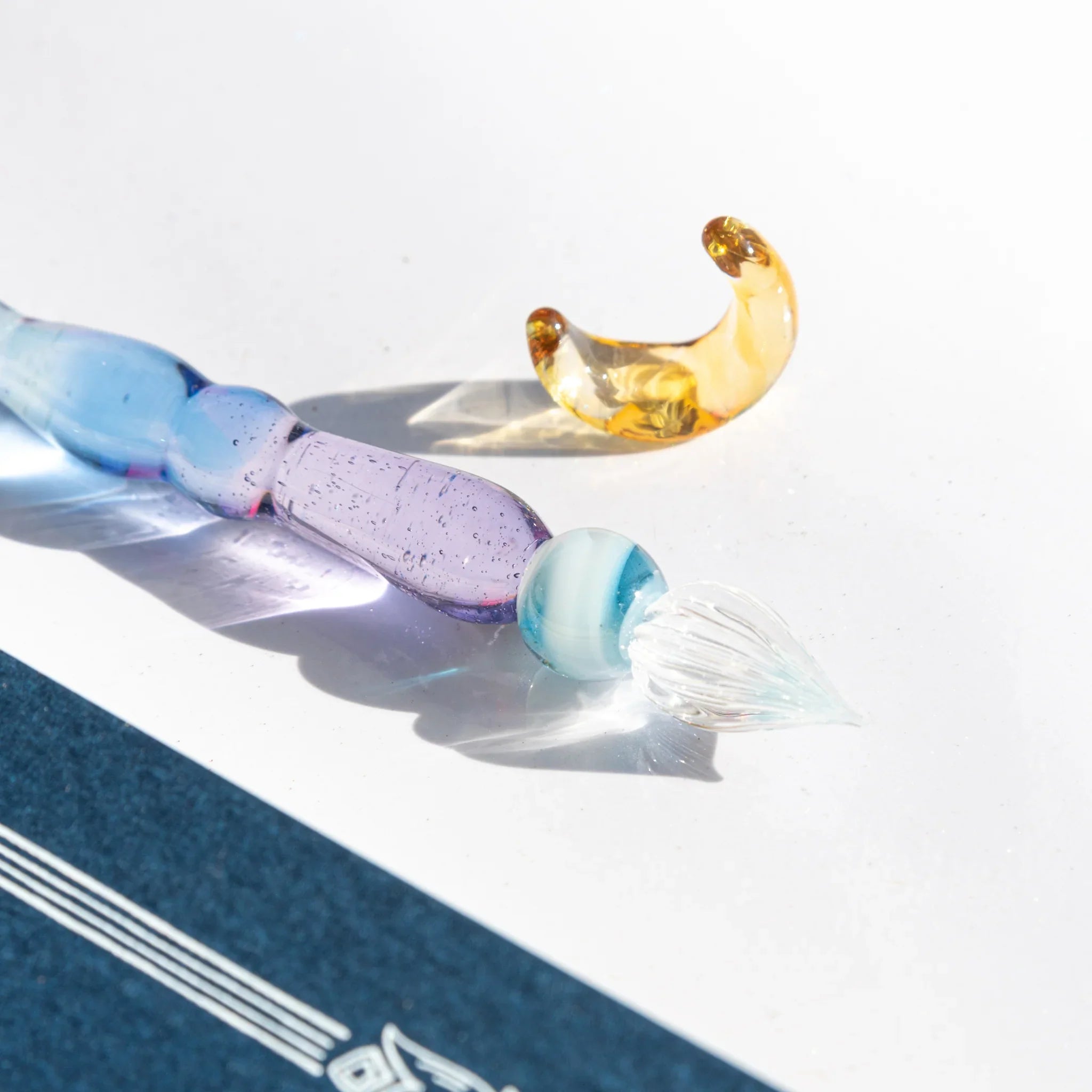 Starlit Night Japanese glass dip pen featuring deep blue glass barrel with gradient color transition to purple base