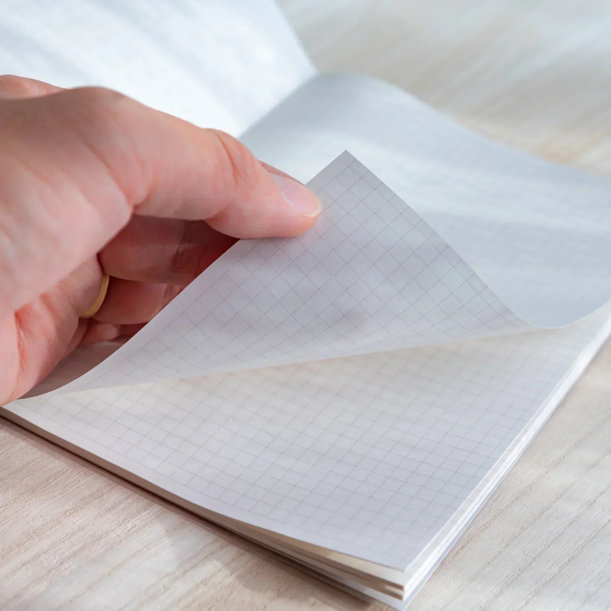 Side view of Taccia Hokusai Mt Fuji Japanese notebook highlighting slim A5 hardcover design