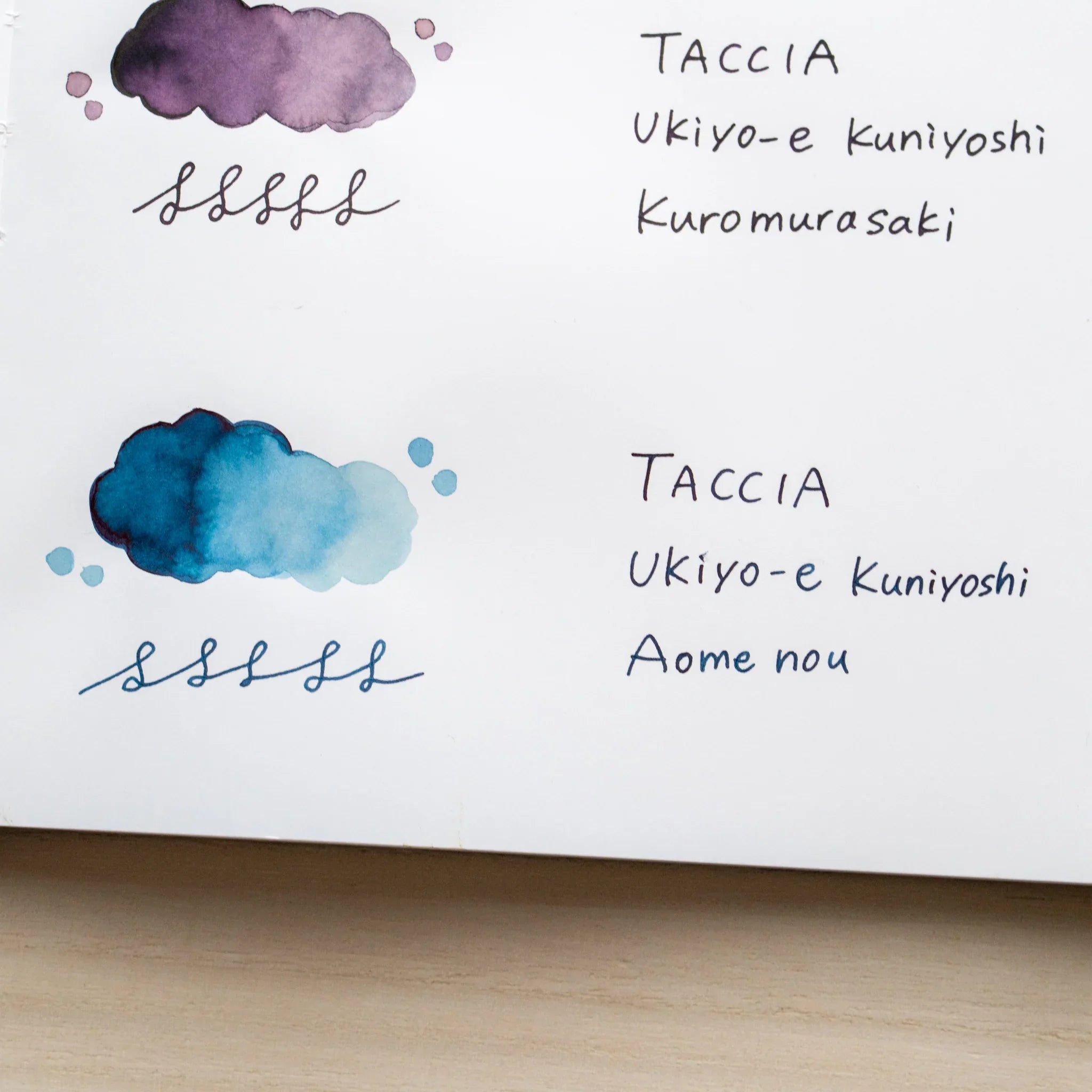 TACCIA Ukiyo-e Kuniyoshi Aomenou hand-painted swatch shown with neighboring ink colors on YU-SARI notebook.