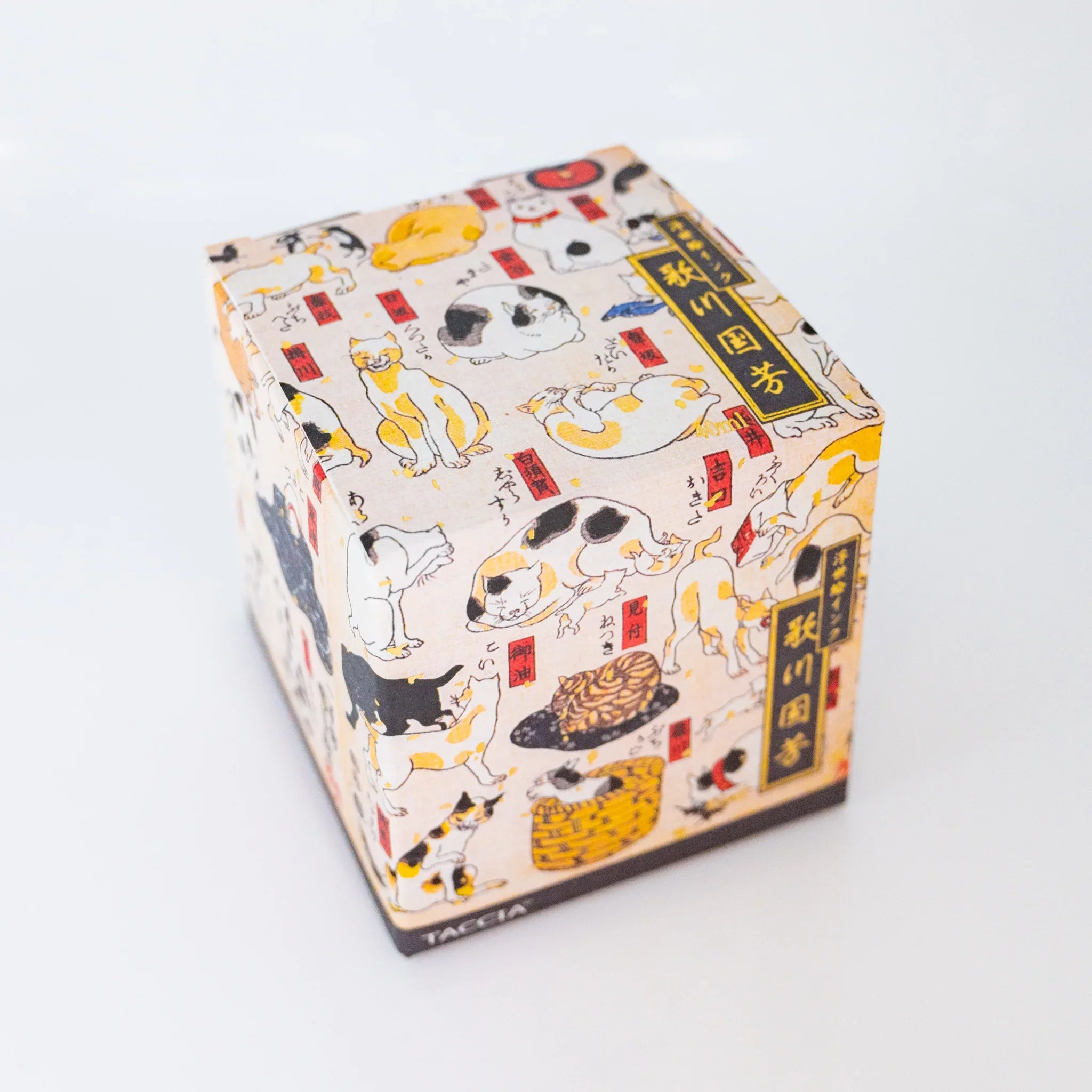 Angled view of TACCIA Kuniyoshi Keshizumi ukiyo-e printed box featuring Cats as 53 Tokaido Stations by Utagawa Kuniyoshi.