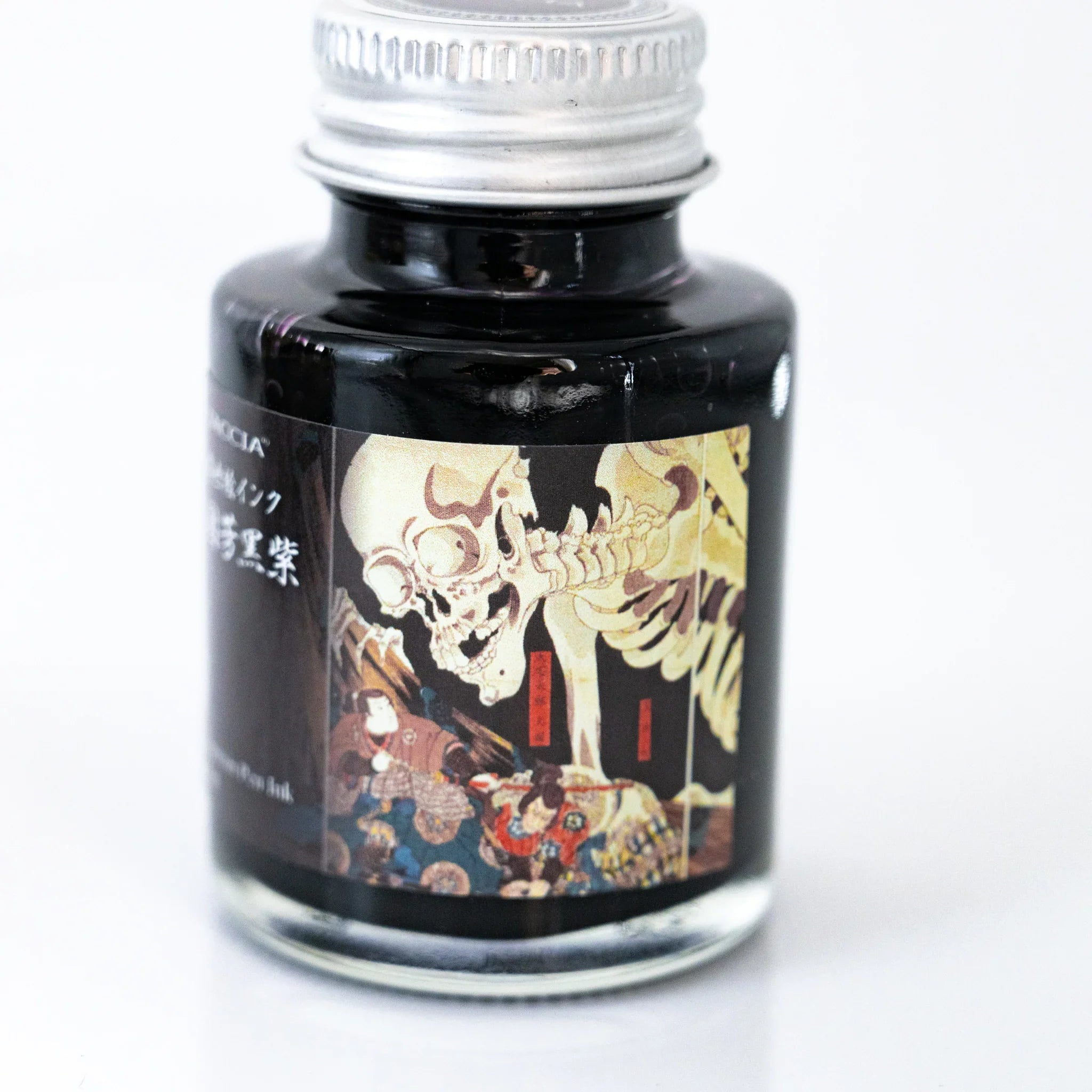 Detail of TACCIA Kuniyoshi Kuromurasaki ink bottle label artwork from Kuniyoshi's Soma no Furudairi.