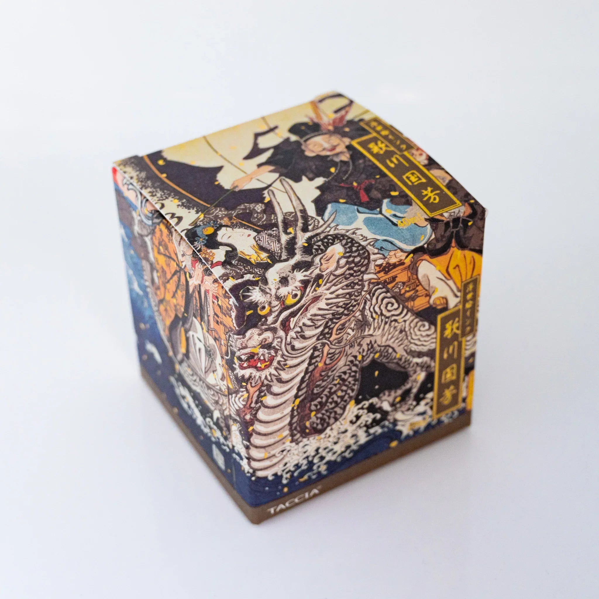 TACCIA Kuniyoshi Uguisucha box angled view featuring dragon and kabuki actor by Utagawa Kuniyoshi.