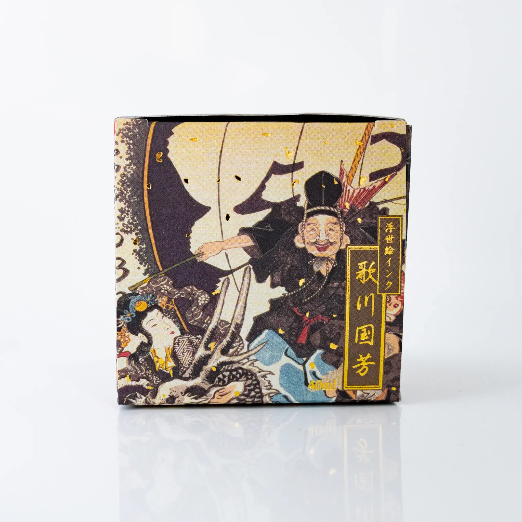 Side panel of TACCIA Kuniyoshi Uguisucha box featuring dragon and kabuki figure by Utagawa Kuniyoshi.