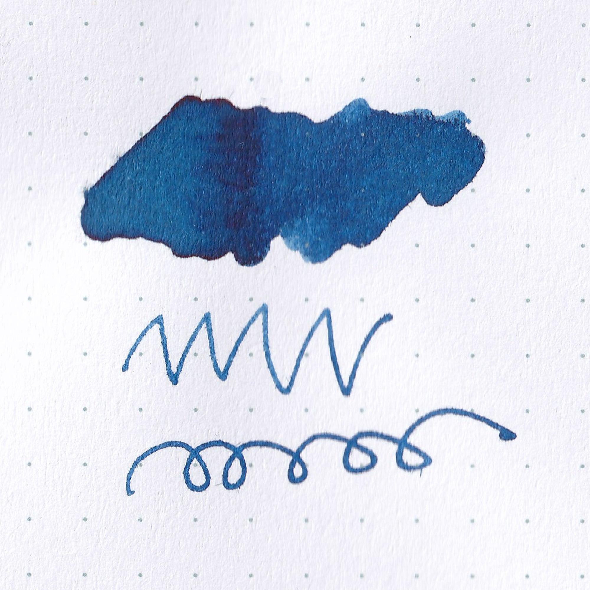 Close-up of Taisho Romance Nighttime Soda ink bottle, showcasing its vibrant blue ink and vintage-inspired label design.