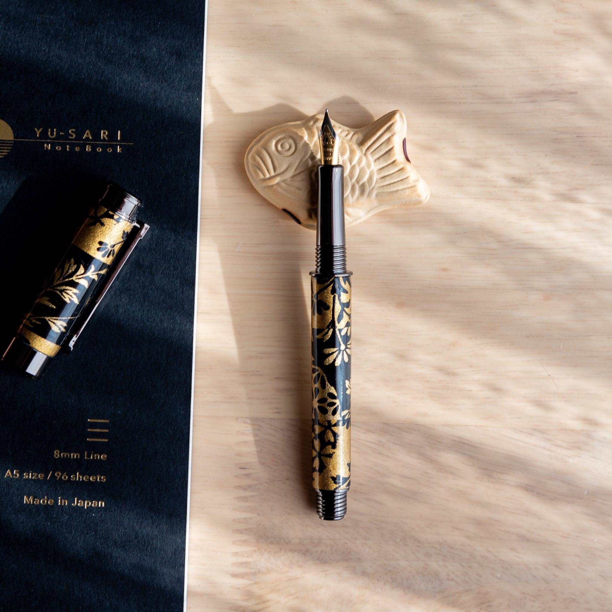 Taiyaki Handcrafted Pen Rest in ceramic showing detailed Japanese fish cake form with artisanal handmade surface