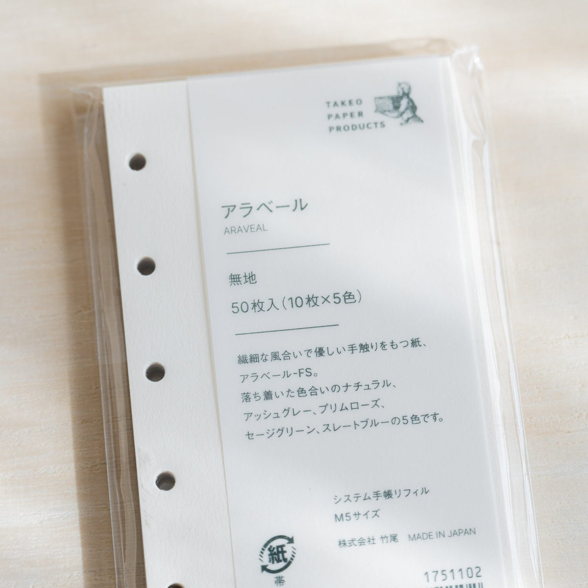 Close-up of the Araveal M5 refill package label with TAKEO PAPER PRODUCTS logo, Japanese text and Made in Japan