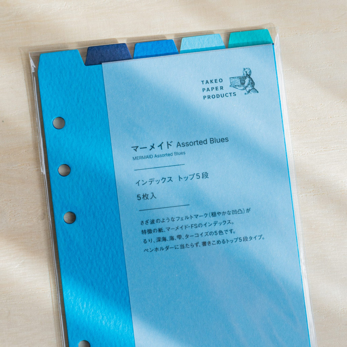 Close-up of the Mermaid Assorted Blues package label in Japanese with TAKEO PAPER PRODUCTS logo