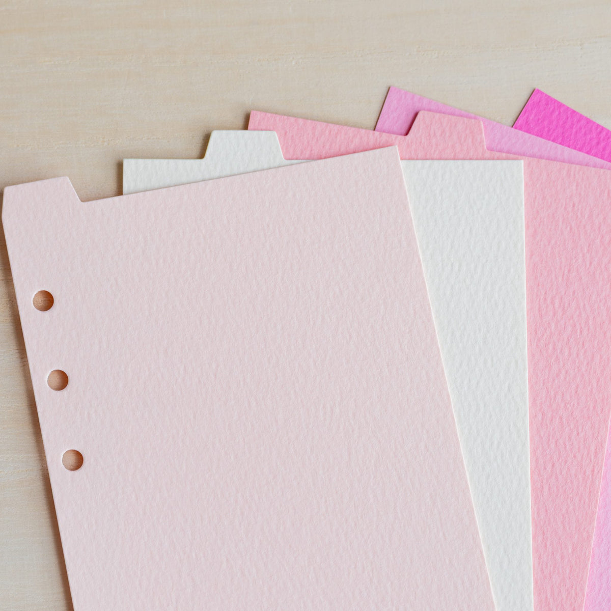 Close-up of Mermaid pink dividers showing the rippled felt-mark texture and staggered tabs