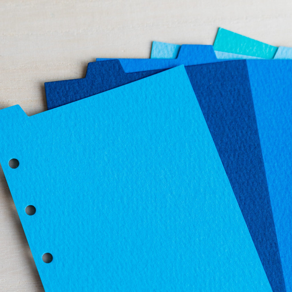 Close-up of Mermaid blue dividers showing the rippled texture in sky blue, navy and cobalt