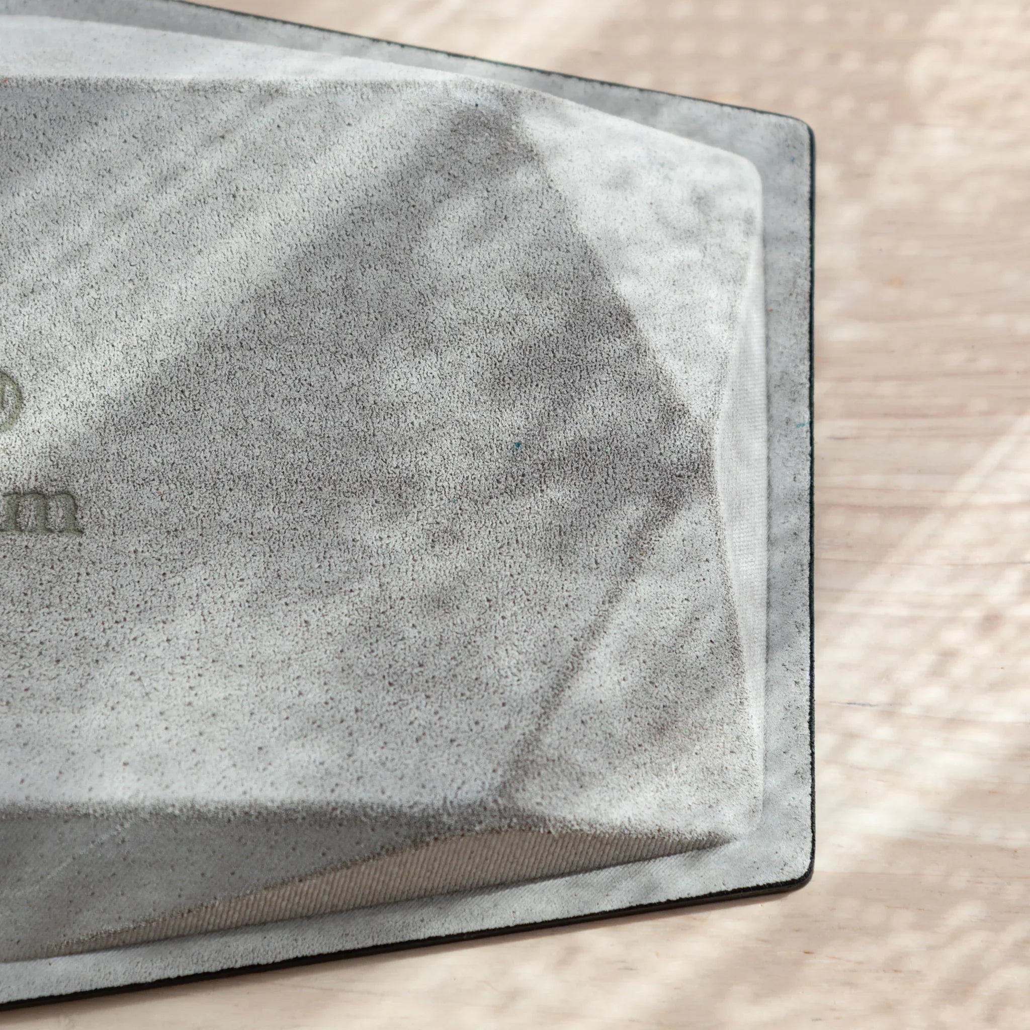 Corner detail of the suede underside of Japanese Pen Tray.