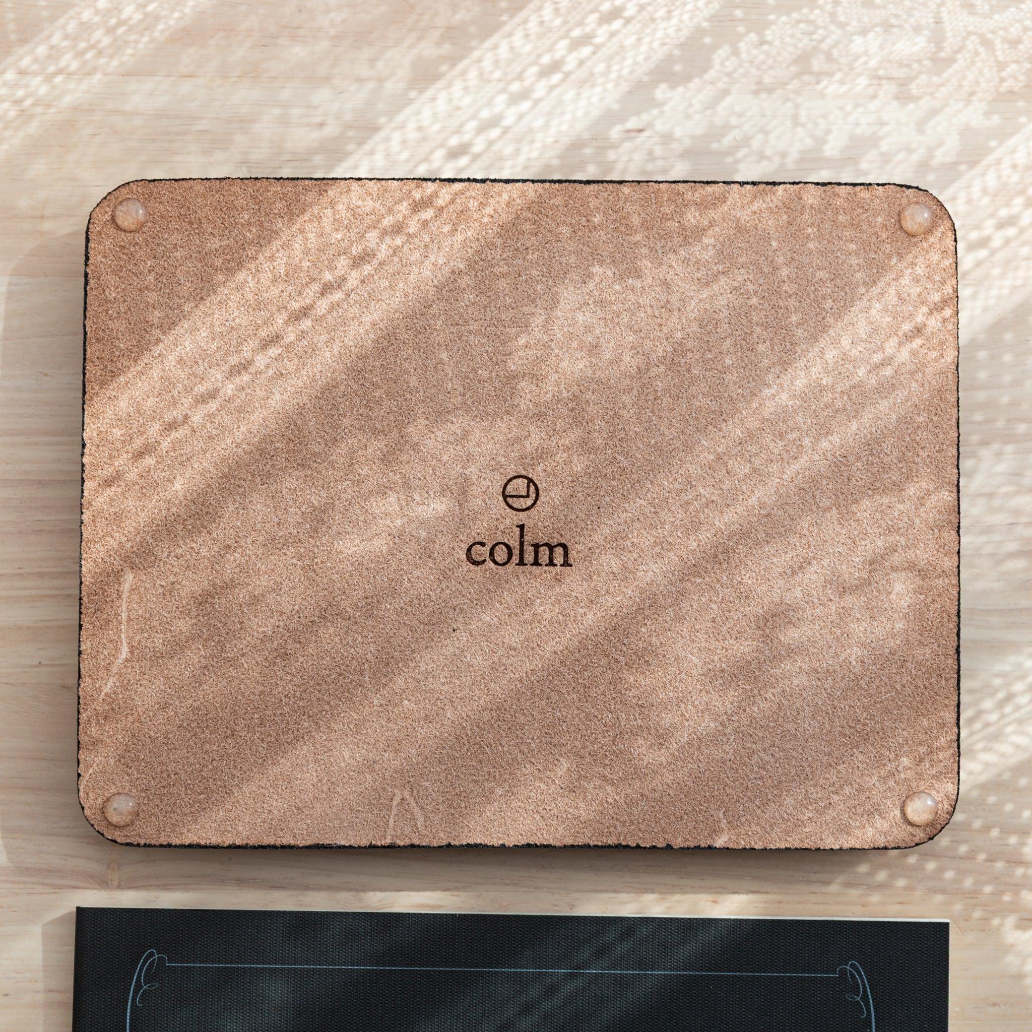 Suede back of Tatsuno Leather Pen Tray Wide with colm logo and rubber pads.