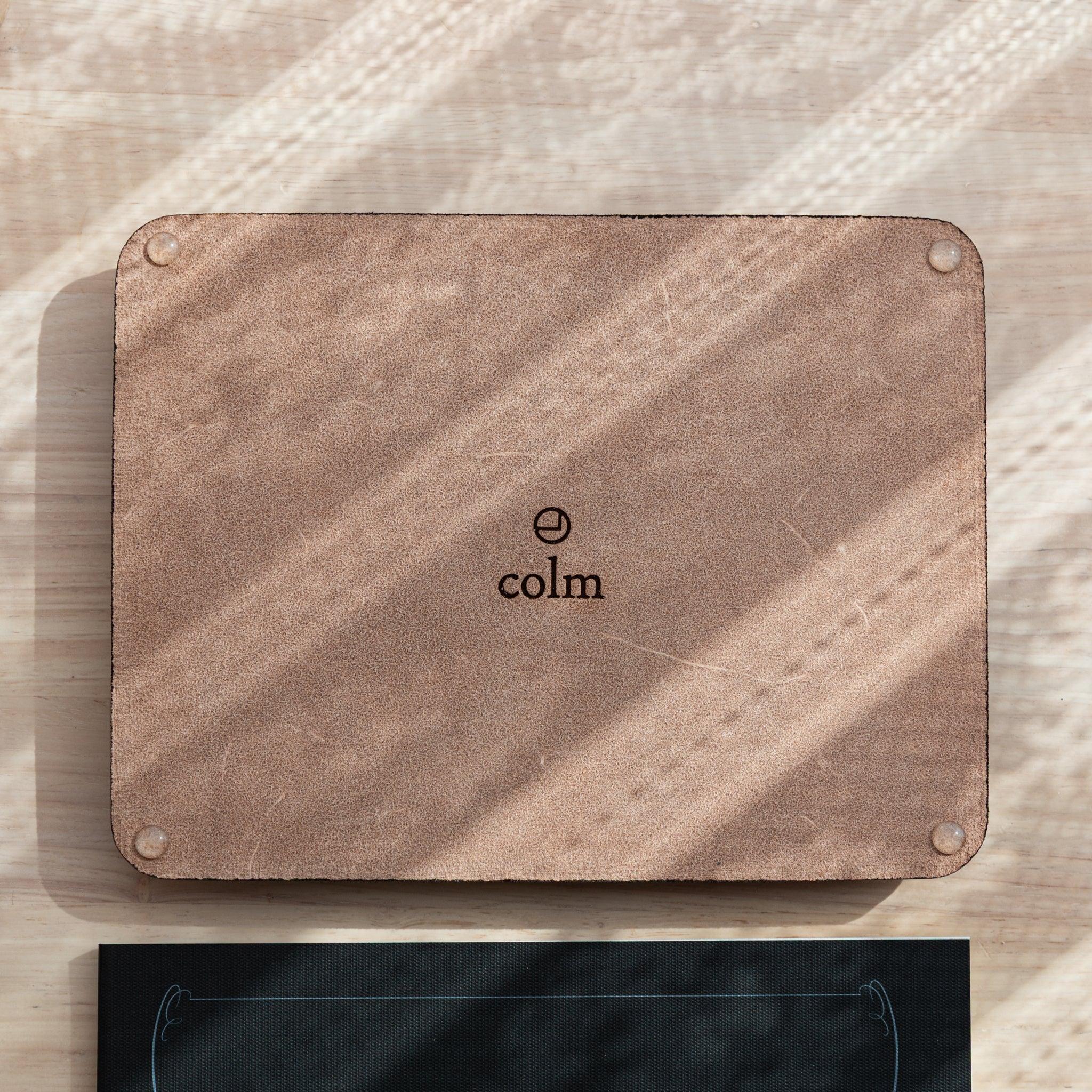 Backside of Japanese Pen Tray showing suede surface and colm logo branding.