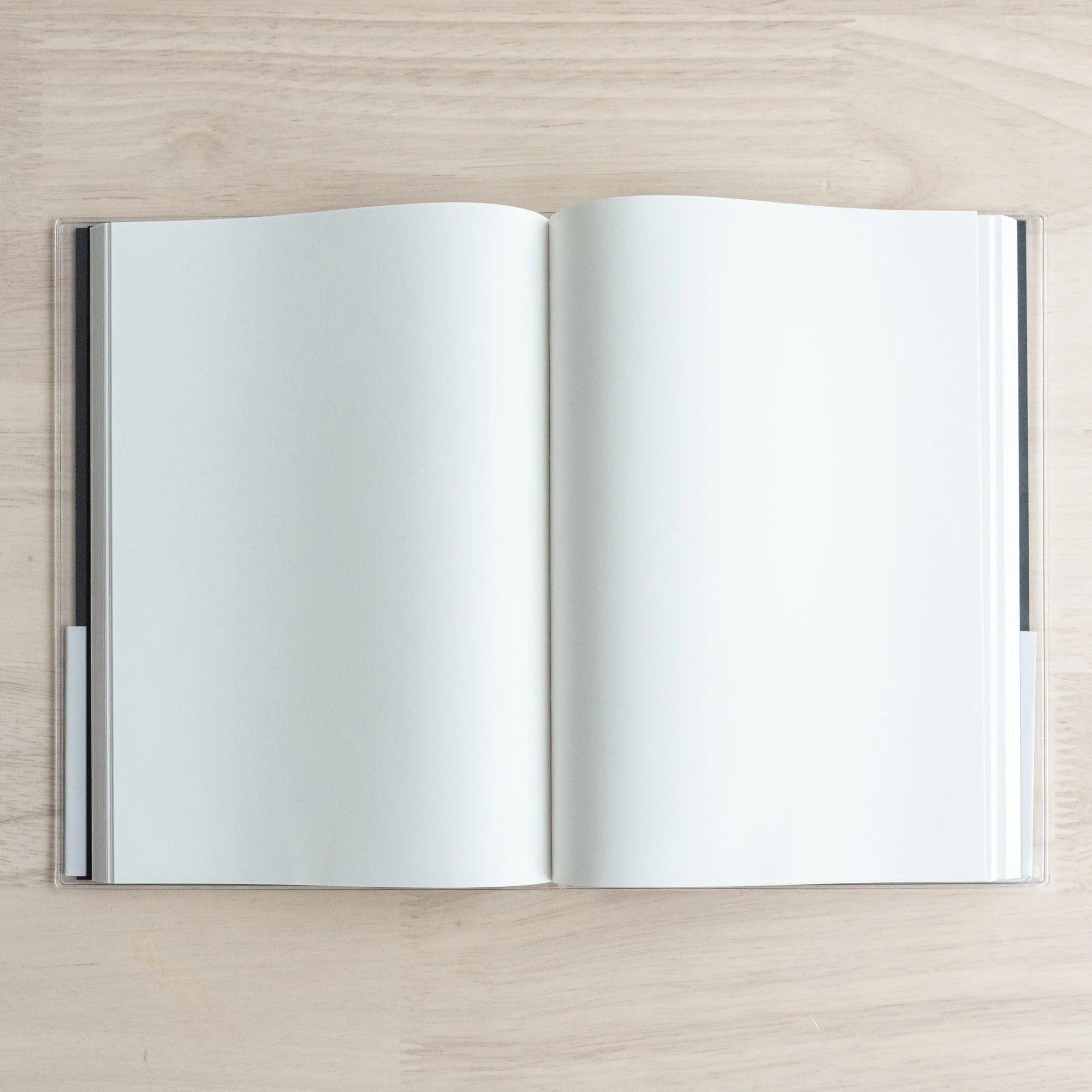 Sanzen hardcover journal A5 with Tomoe River paper, stacked position shot emphasizing quality construction