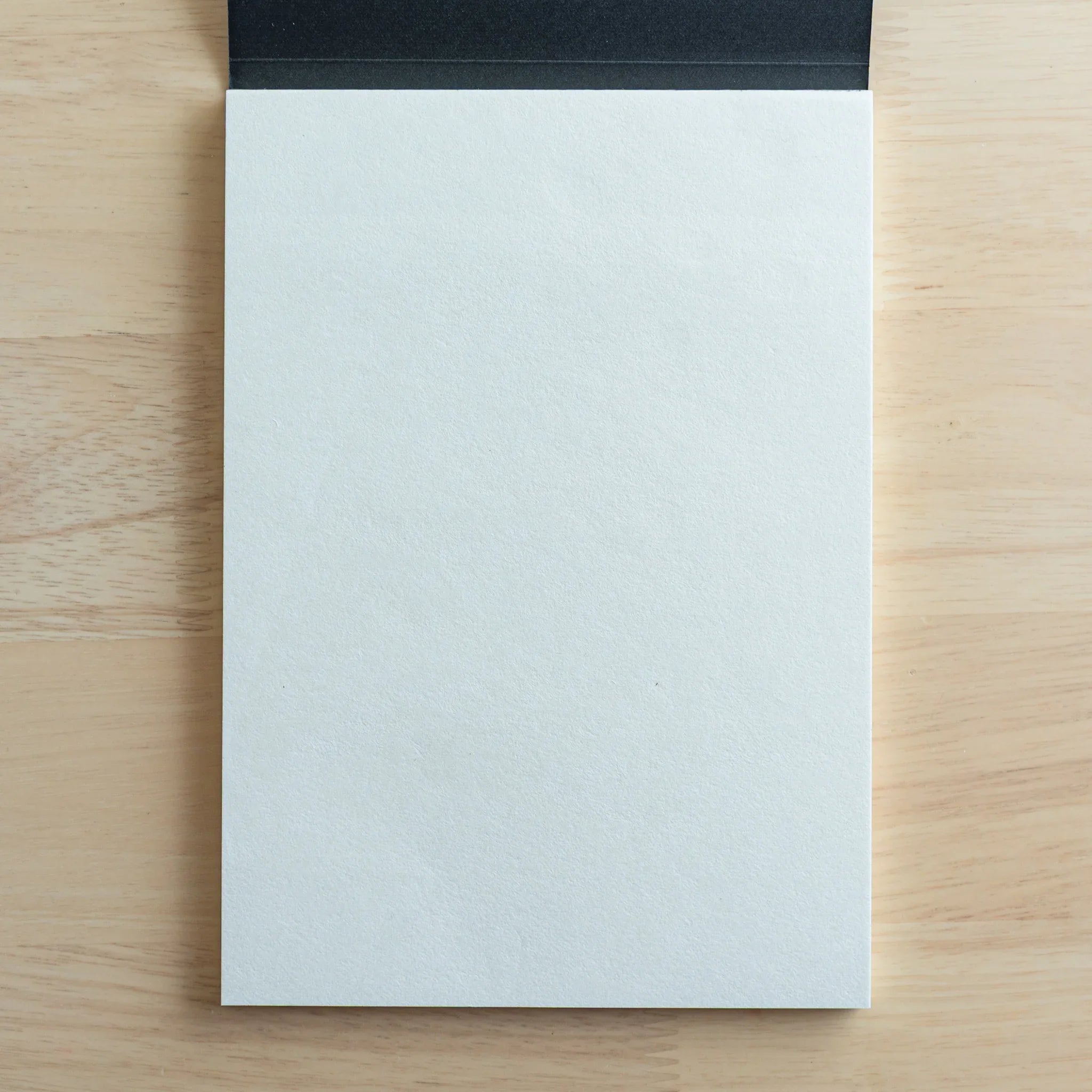 Sanzen Tomoe River Japanese writing pad blank section showing paper thinness edge fountain pen for fountain pen writing