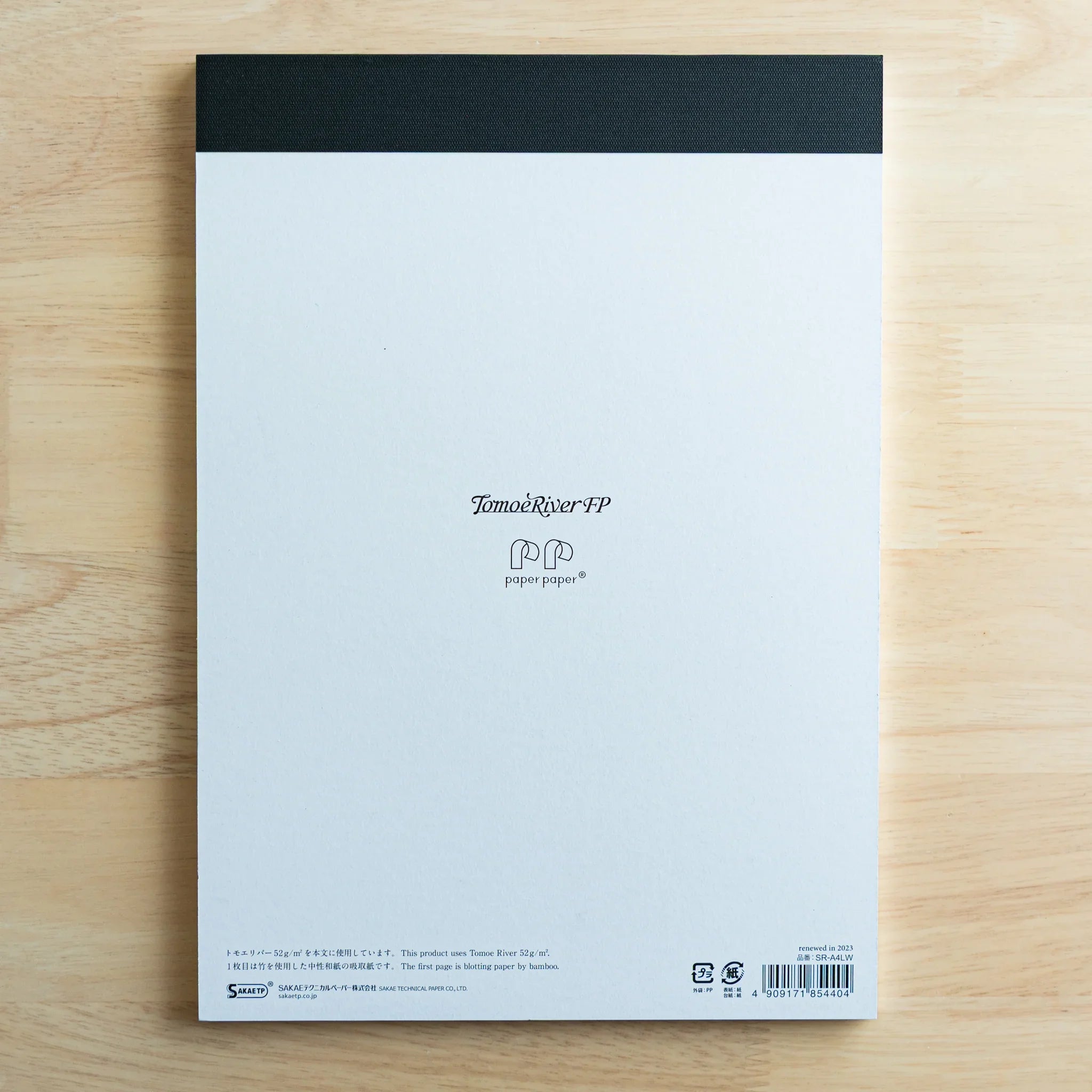 Japanese Tomoe River FP pad blank pages interior showing paper edge thinness and quality detail for fountain pen writing