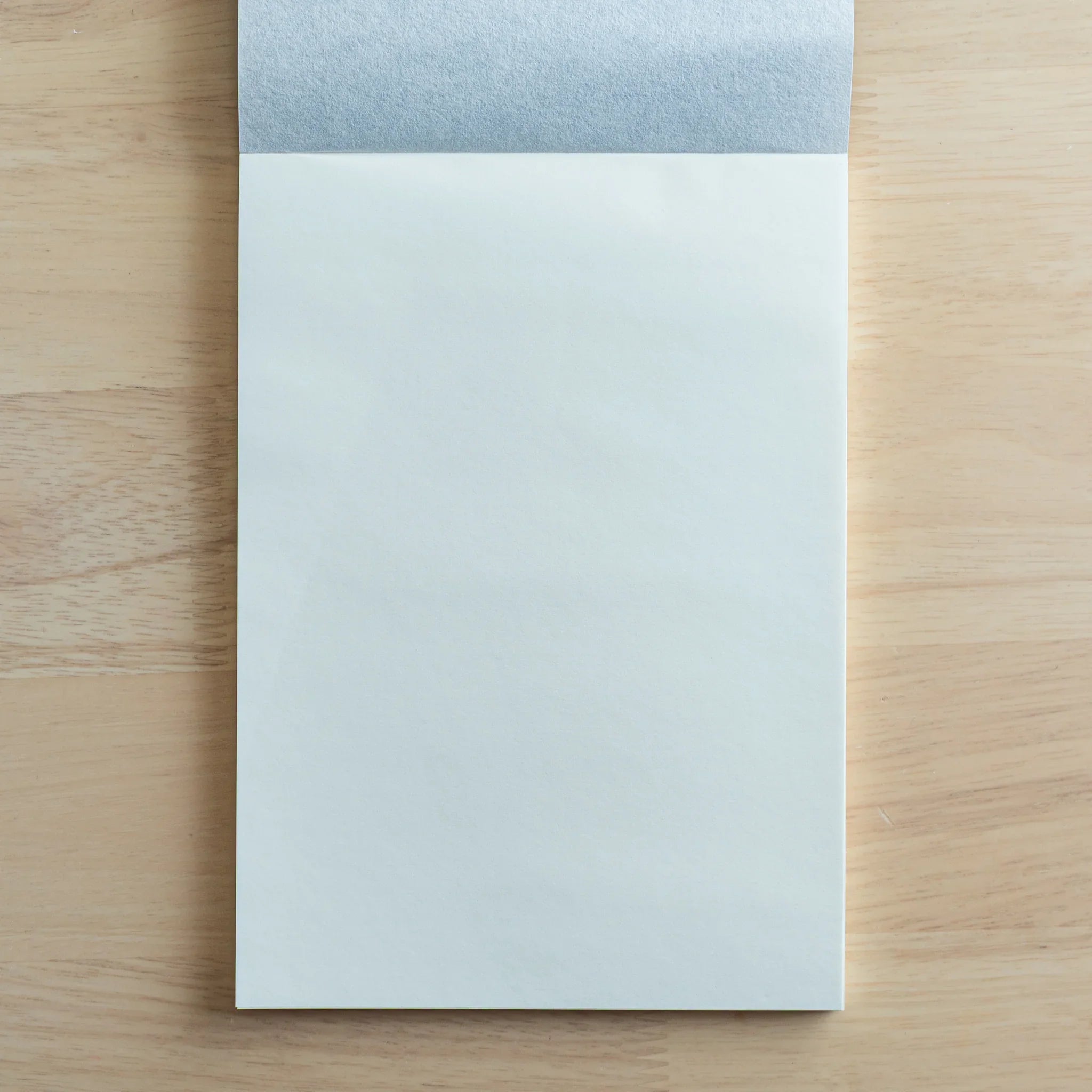 Sanzen Tomoe River FP writing pad blank page spread showing pristine white Tomoe River paper for fountain pen writing