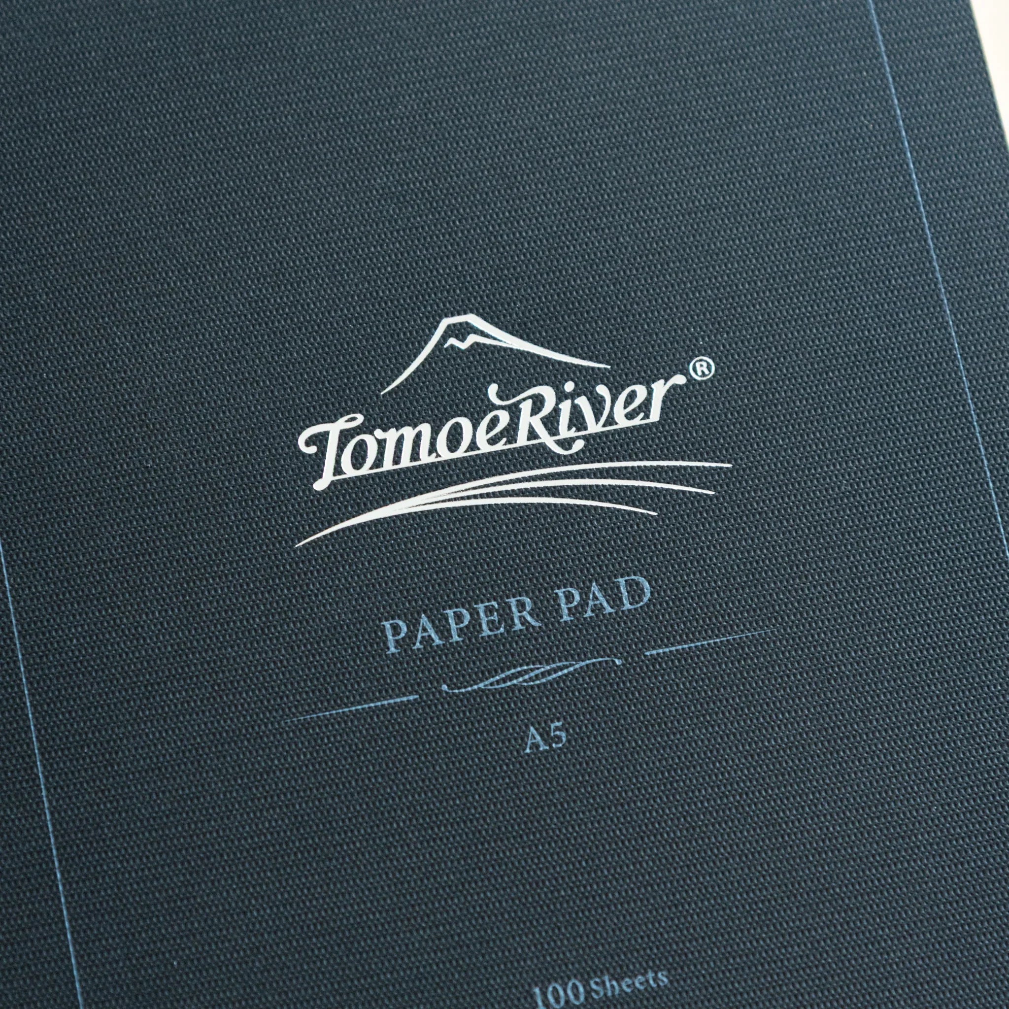 Japanese Tomoe River FP pad front cover showing minimal branding with finish details for fountain pen writing