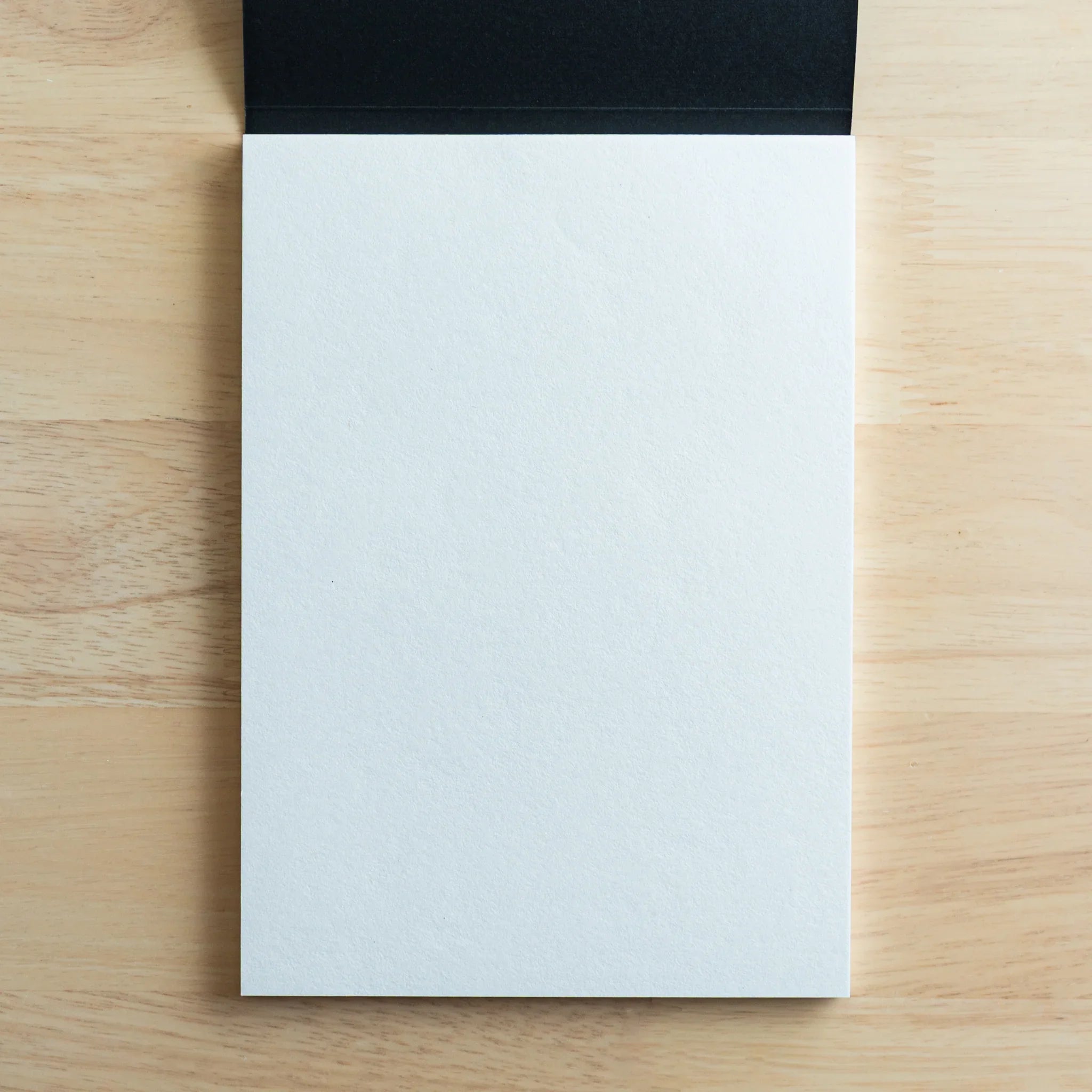 Tomoe River FP writing pad blank pages spread displaying smooth texture Japanese fountain pen paper for fountain pen writing