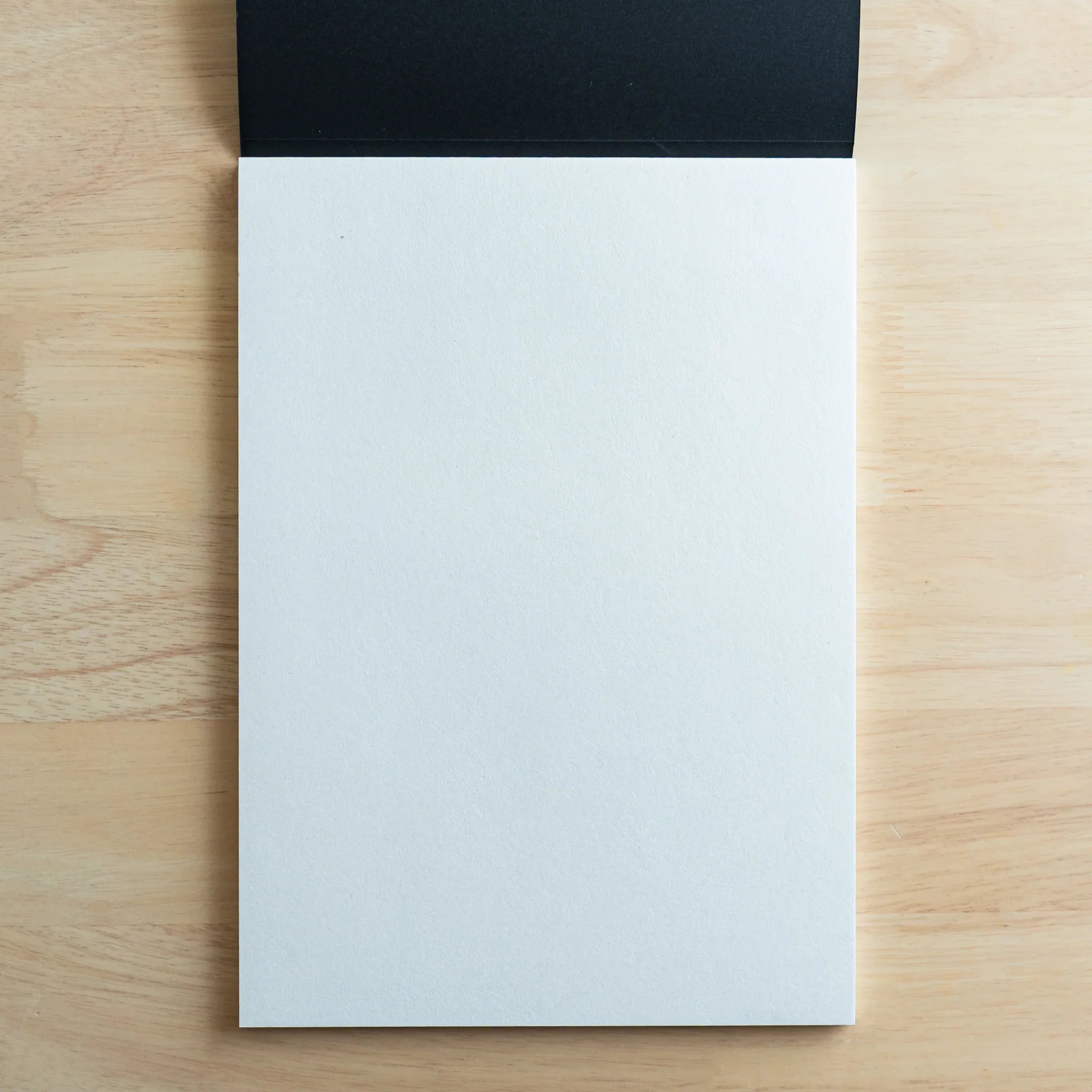 Tomoe River fountain pen writing pad blank pages interior demonstrating ultra-thin Japanese paper for fountain pen writing