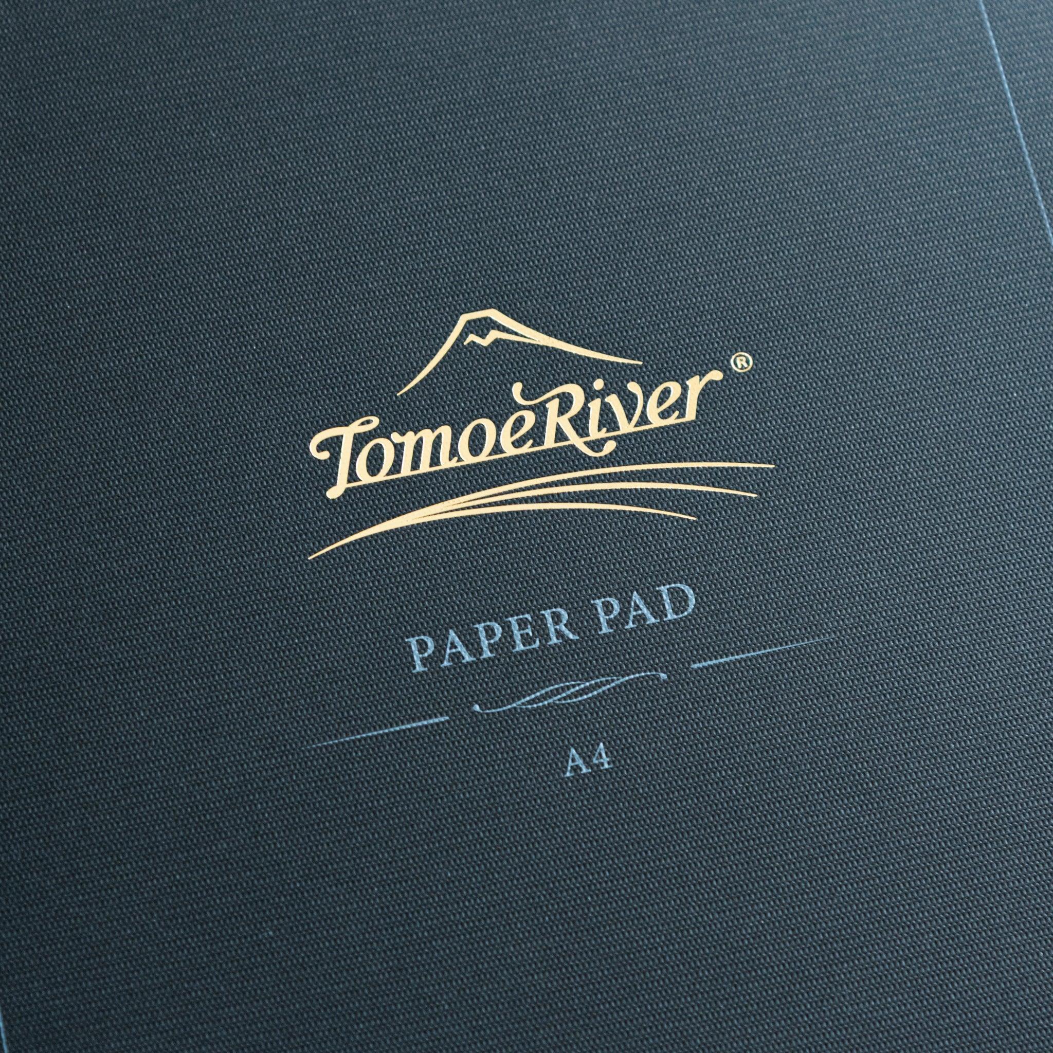 Tomoe River FP writing pad dark cover with Japanese branding and specification details embossed for fountain pen writing