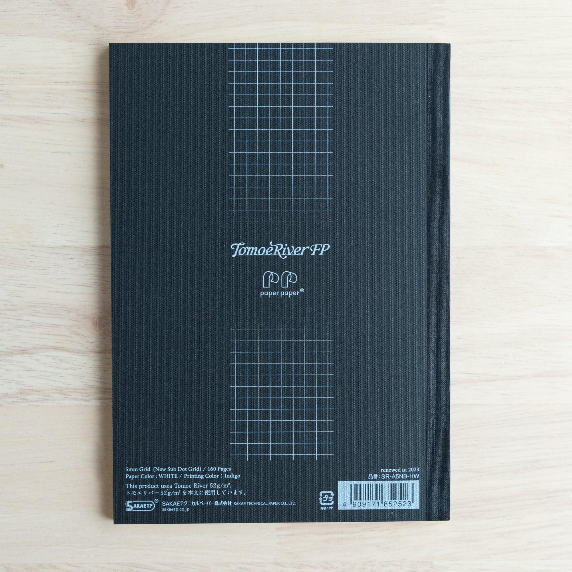 The back cover of a Tomoe River FP notebook, showing a 5mm grid design, product information, and the "paper paper" logo.