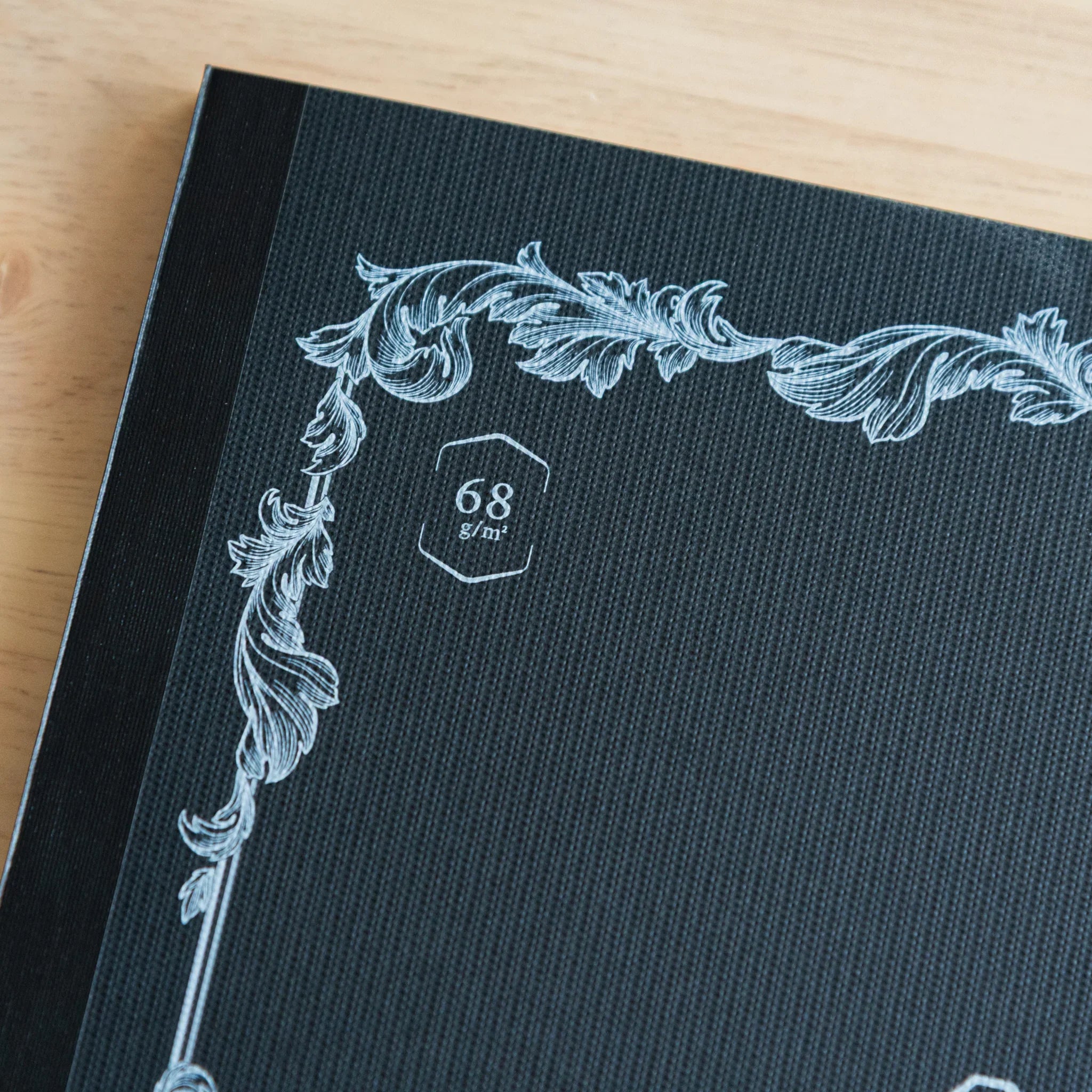 Tomoe River limited B5 notebook pages showing 68gsm FP-friendly paper with minimal light ruling lines