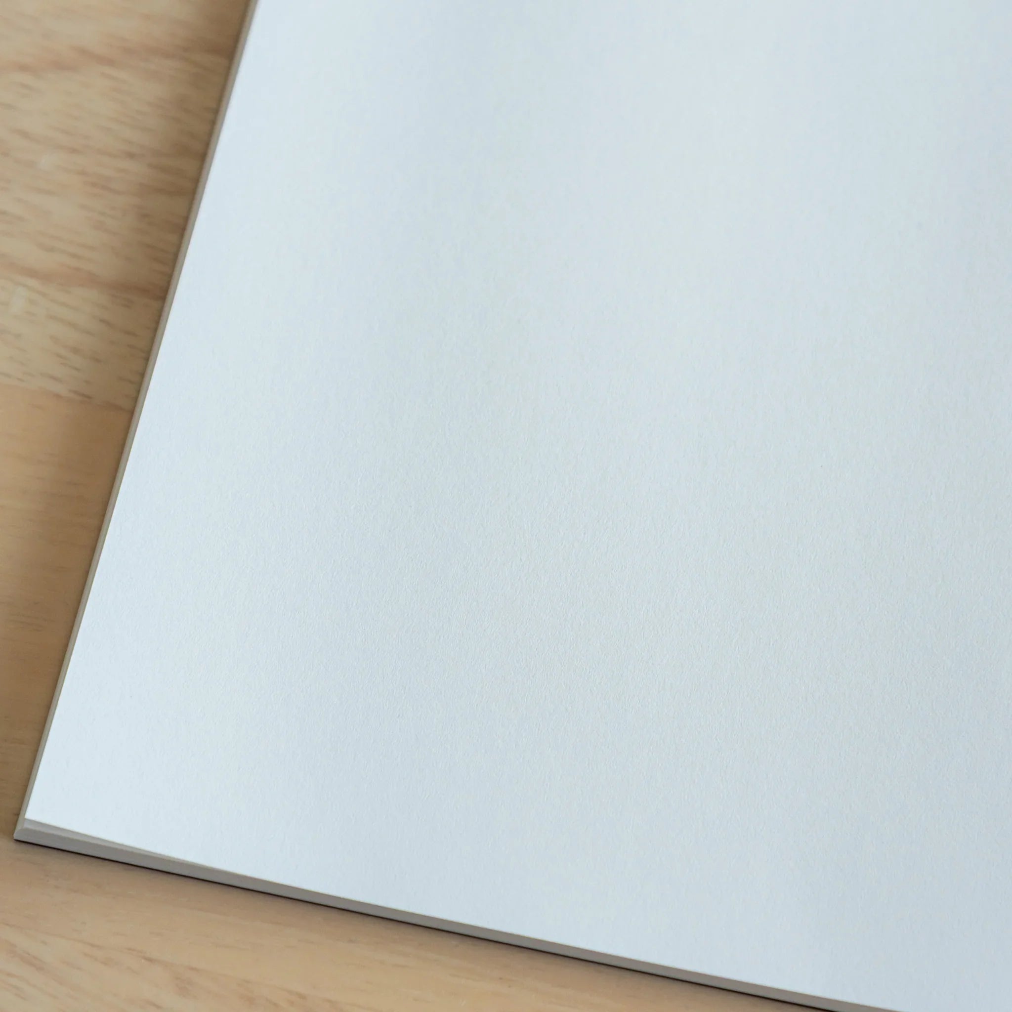 Sanzen limited edition B5 notebook soft cover closed showing navy textured cover surface design, Japanese notebook