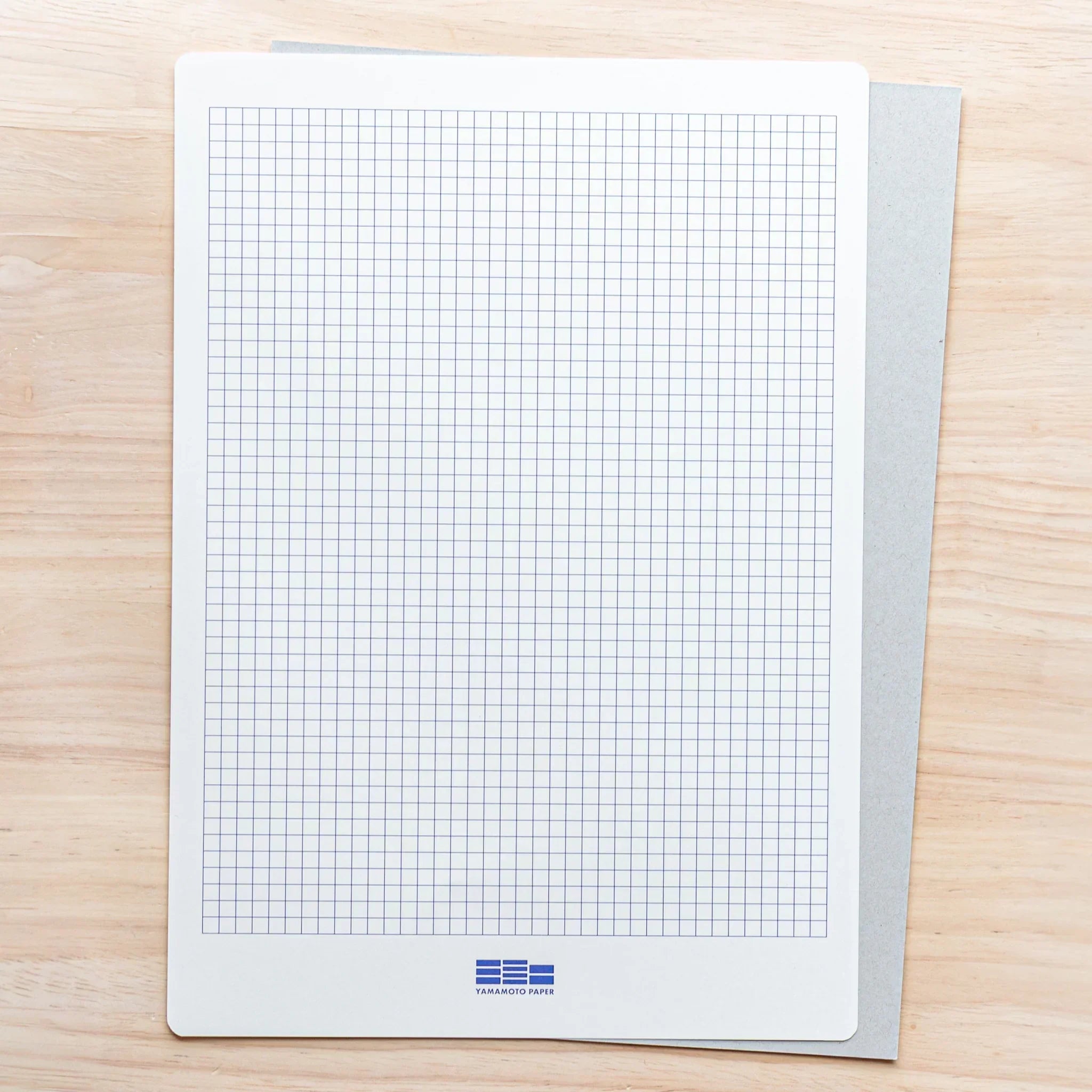 Sanzen Tomoe River Japanese Loose Leaf Paper A4 with grid guide sheet underneath, 52gsm, 50 sheets for smooth writing.