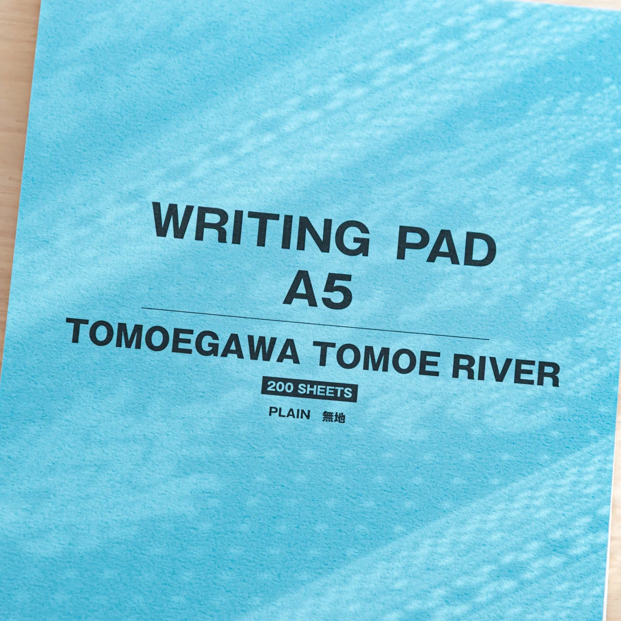 Close-up of Tomoegawa Tomoe River A5 Writing Pad cover, premium Japanese Note Book designed for fountain pen use.