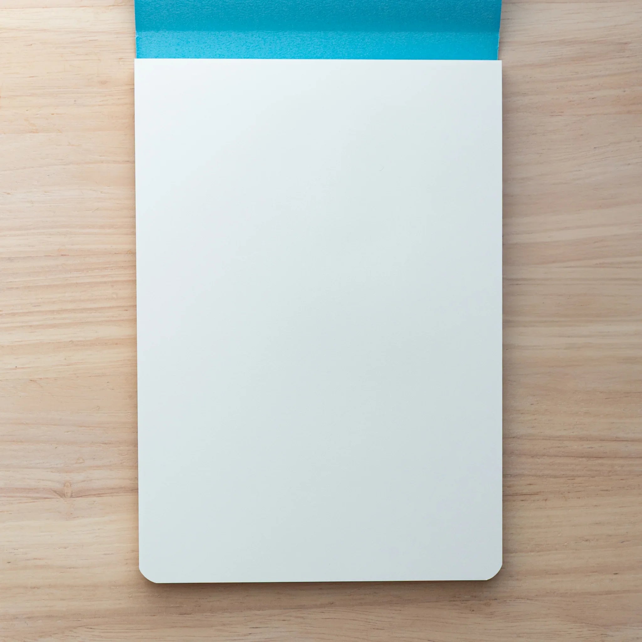 Writing pad showing cover with brand name identification and detailed product information clearly displayed