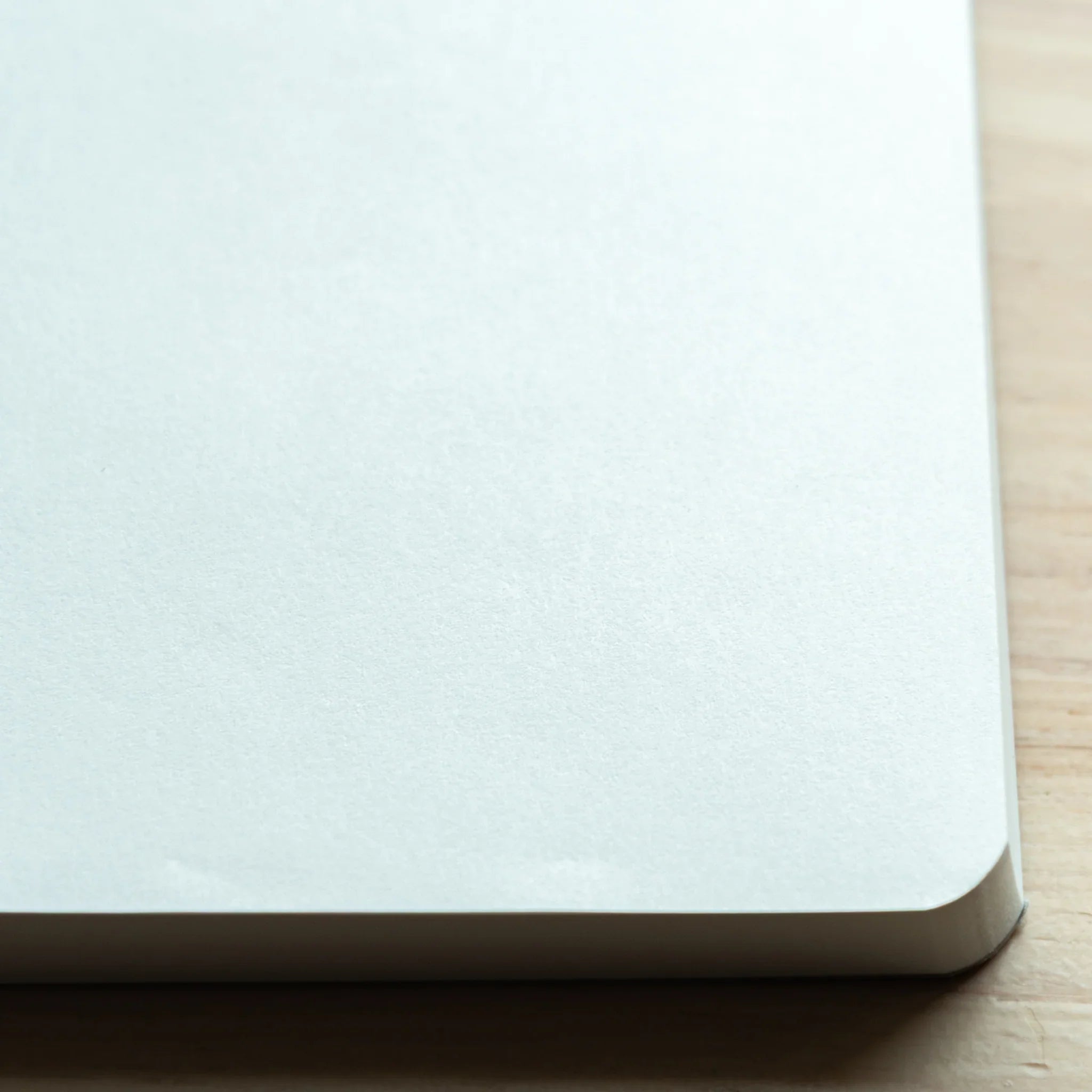 Tomoe River paper pad with detailed cover artwork and product label identification displayed clearly