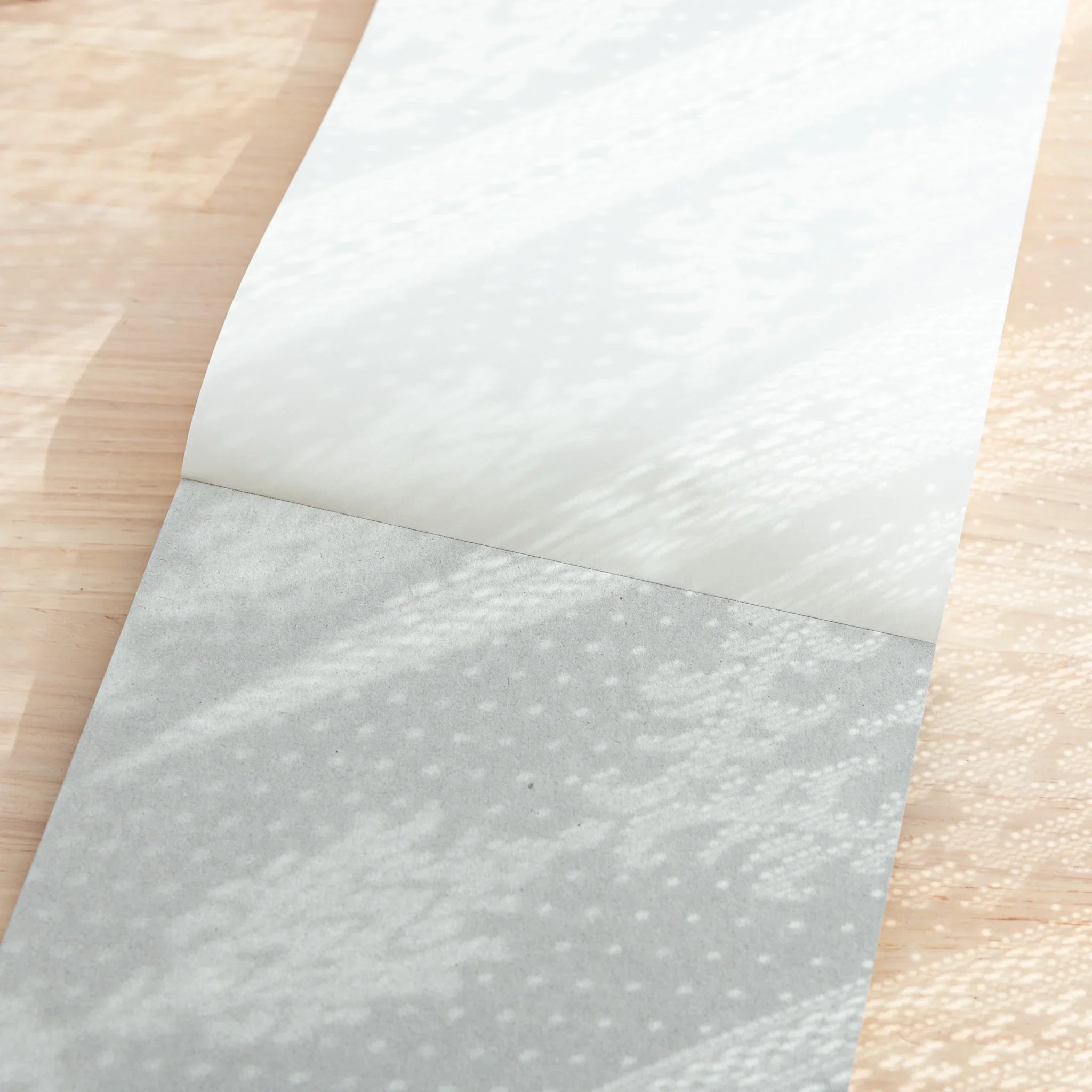 A5 writing pad revealing side binding and cover design details clearly visible on display area section