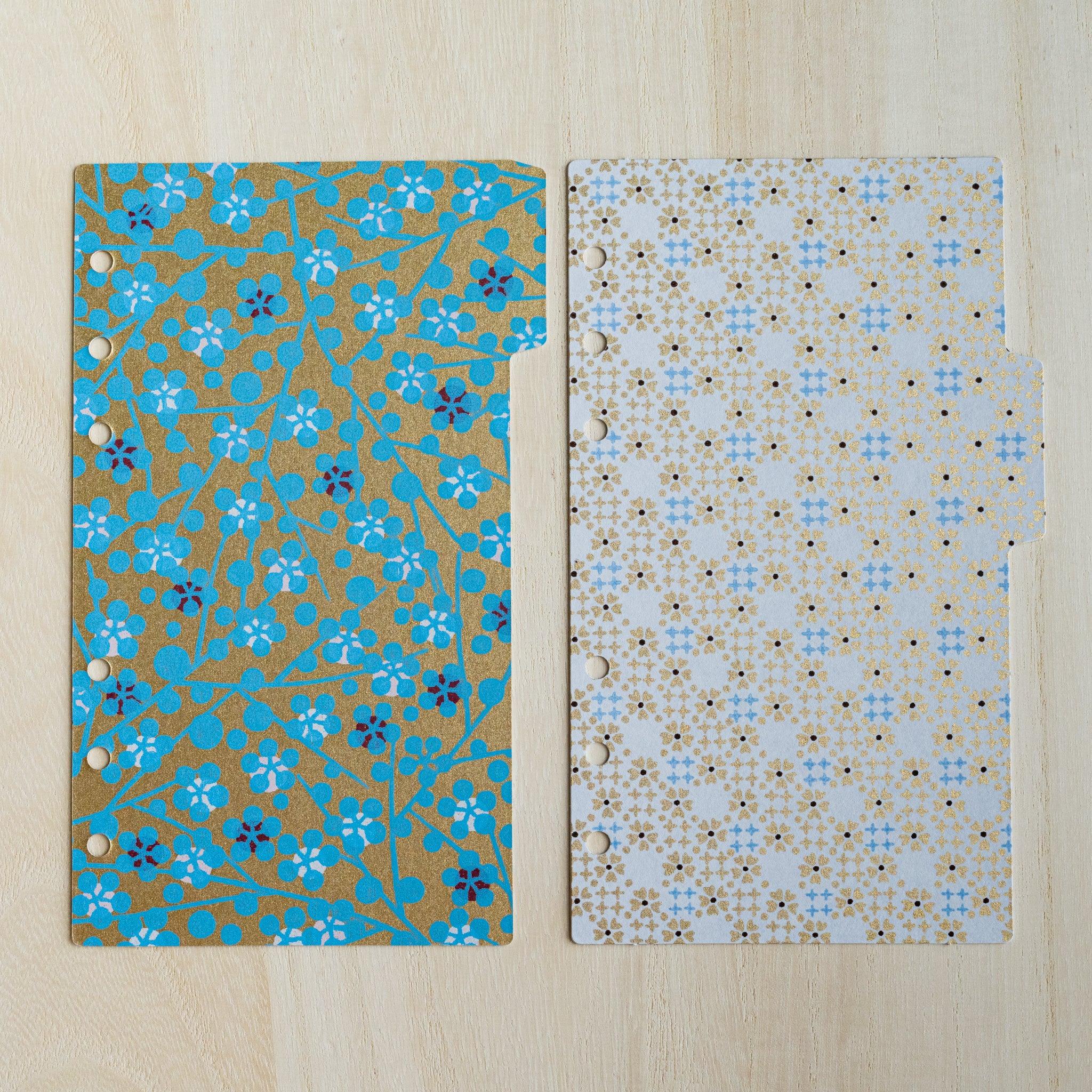 Two Tone index dividers side by side, gold with turquoise plum blossoms and white with gold lattice pattern