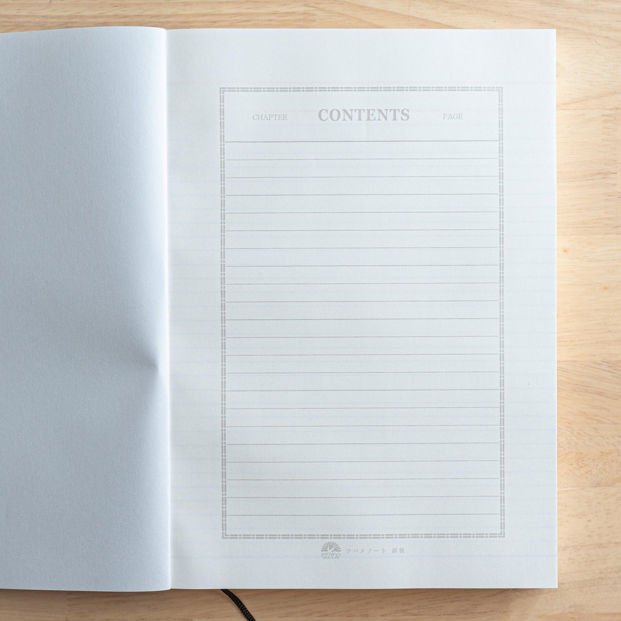 An open Japanese notebook featuring a structured contents page with lined sections for chapters and page numbers, highlighting premium Japanese stationery.