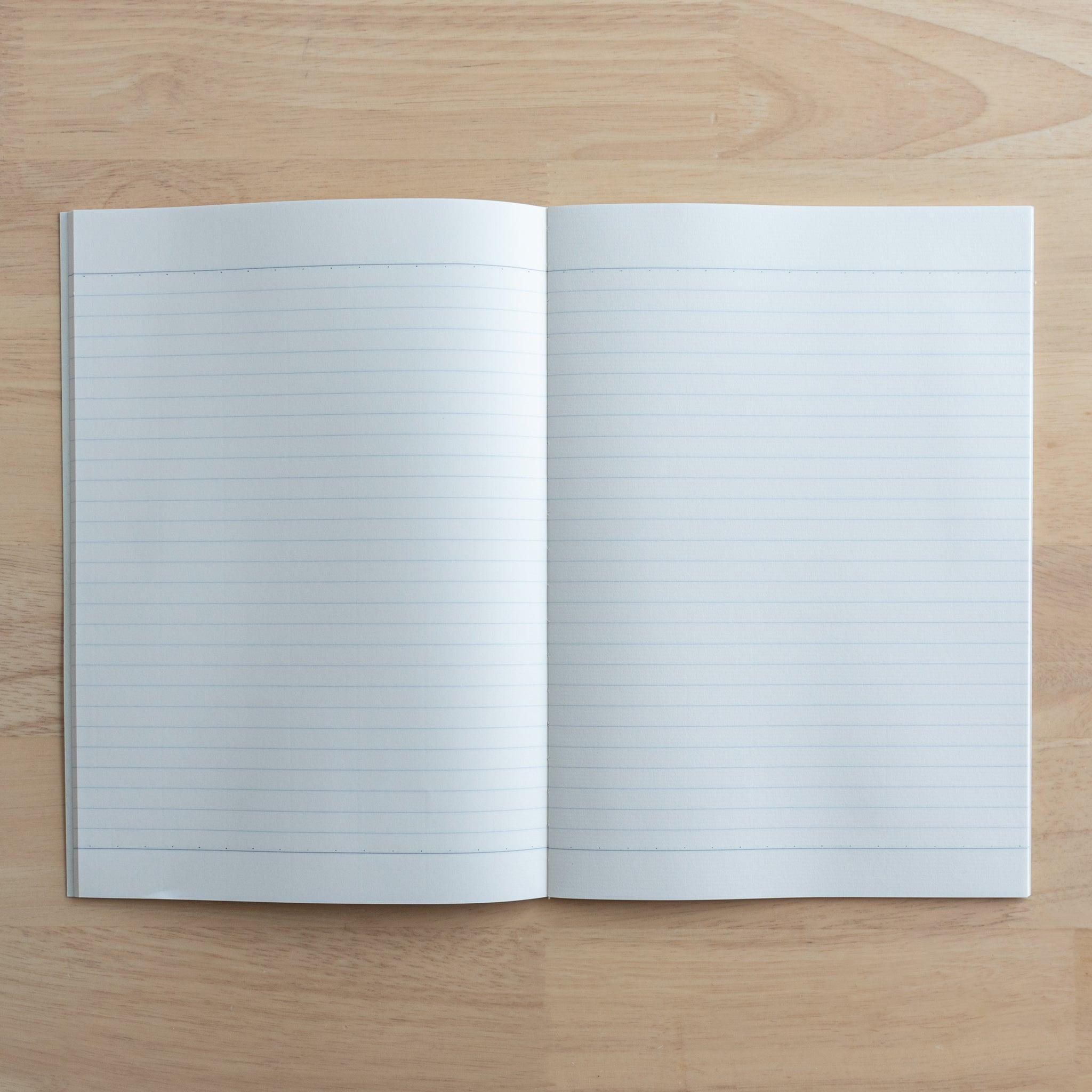 A fully opened Tsubame Japanese notebook with two lined pages, featuring high-quality, acid-free paper designed for smooth writing, representing fine Japanese stationery.