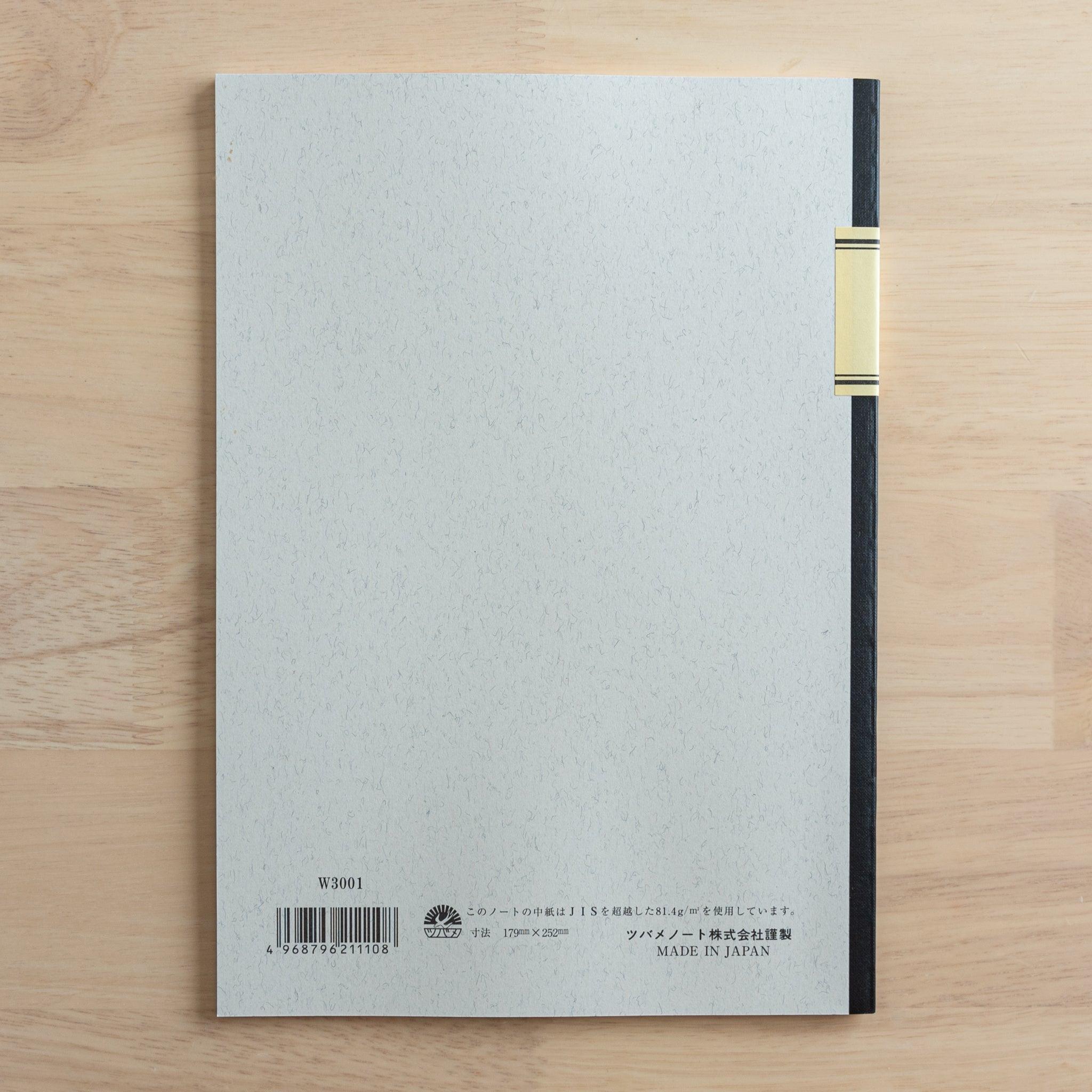 The back cover of a Tsubame Japanese notebook with a black spine, featuring product details, a barcode, and "Made in Japan" text, representing fine Japanese stationery.